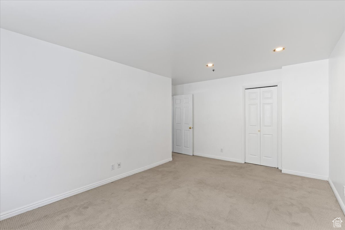 View of carpeted spare room