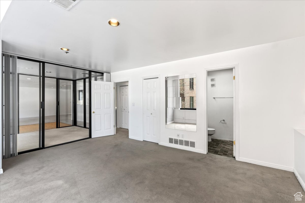 Unfurnished room featuring carpet floors