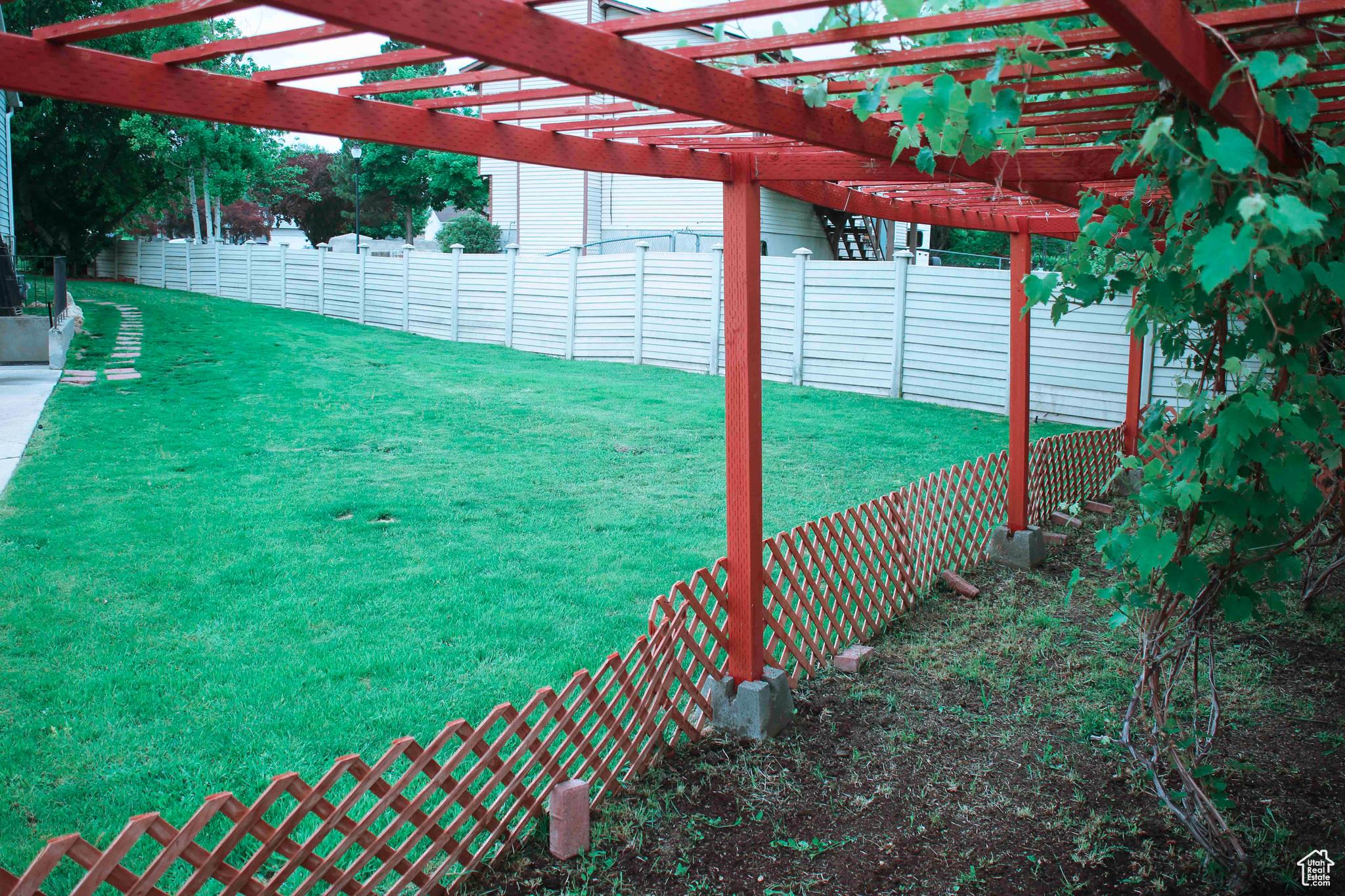 View of yard featuring a pergola