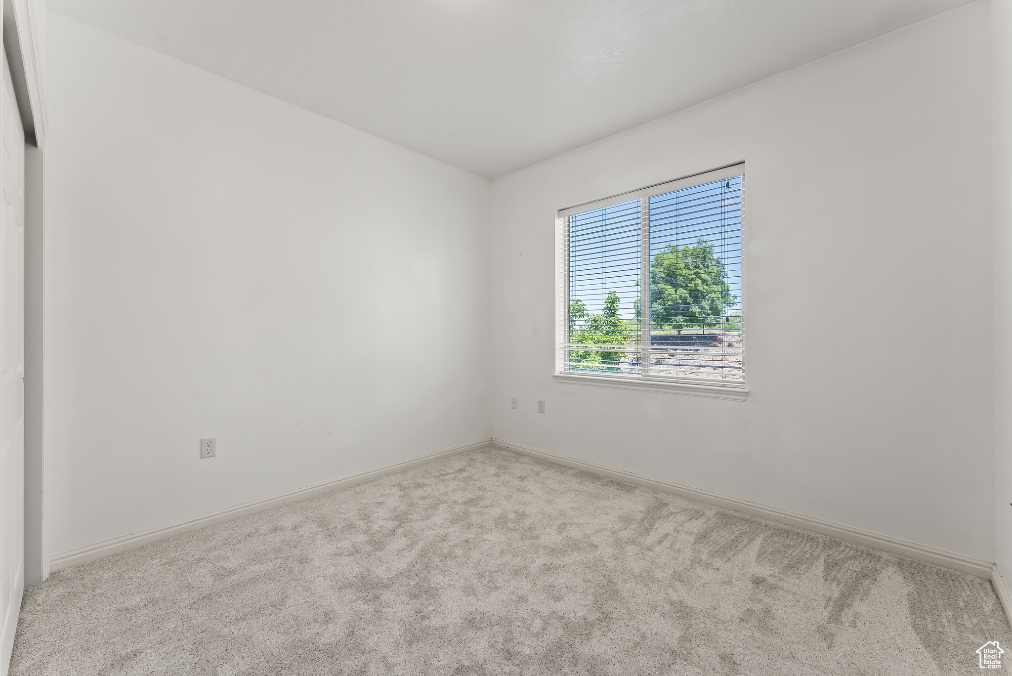 Spare bedroom with new carpet