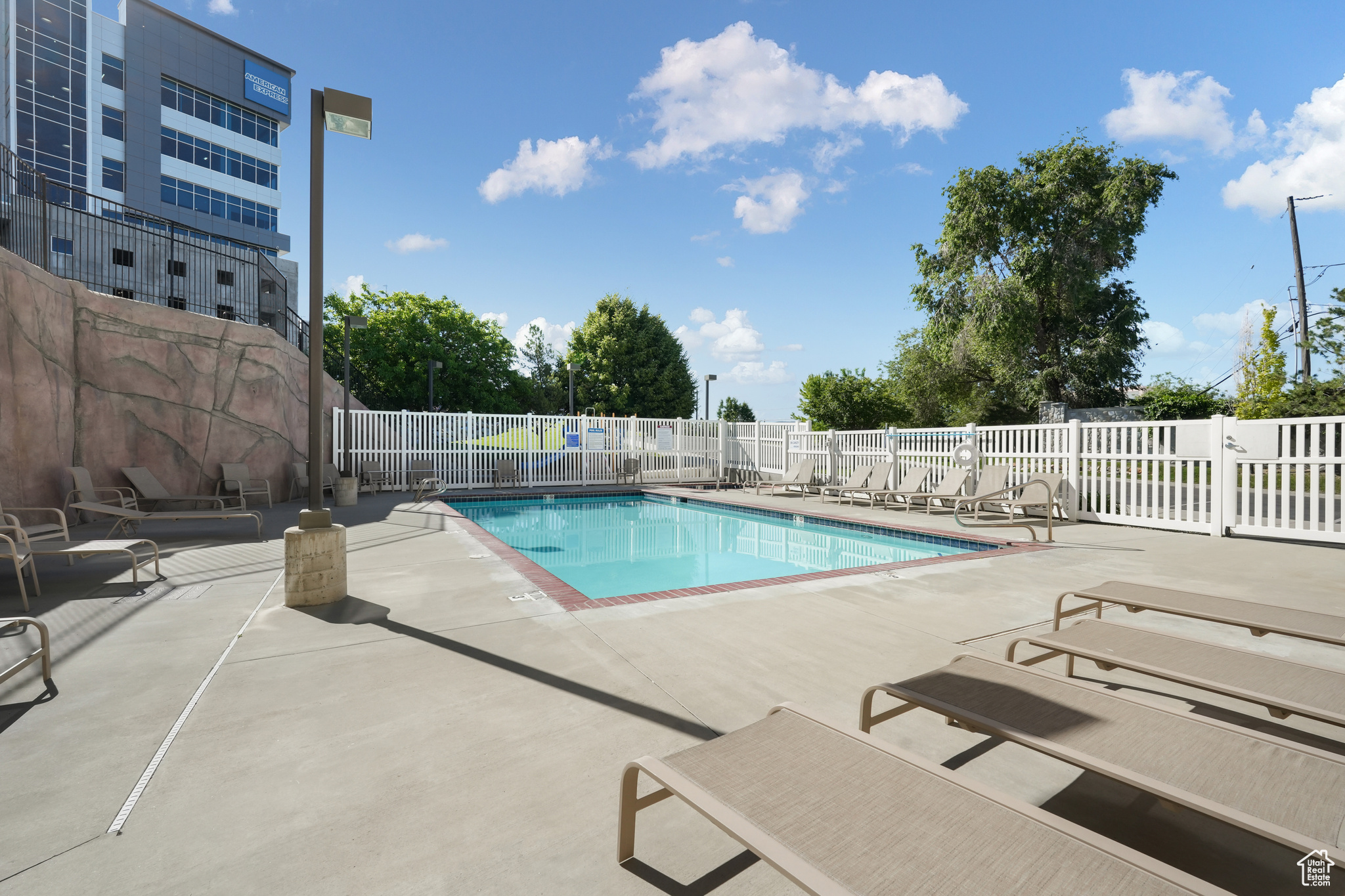 View of pool featuring a patio area, refinished pool!