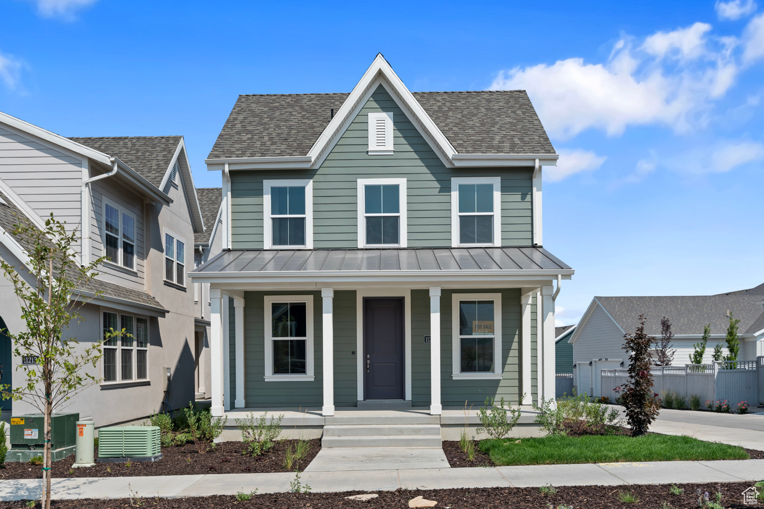 View of front of house featuring covered porch