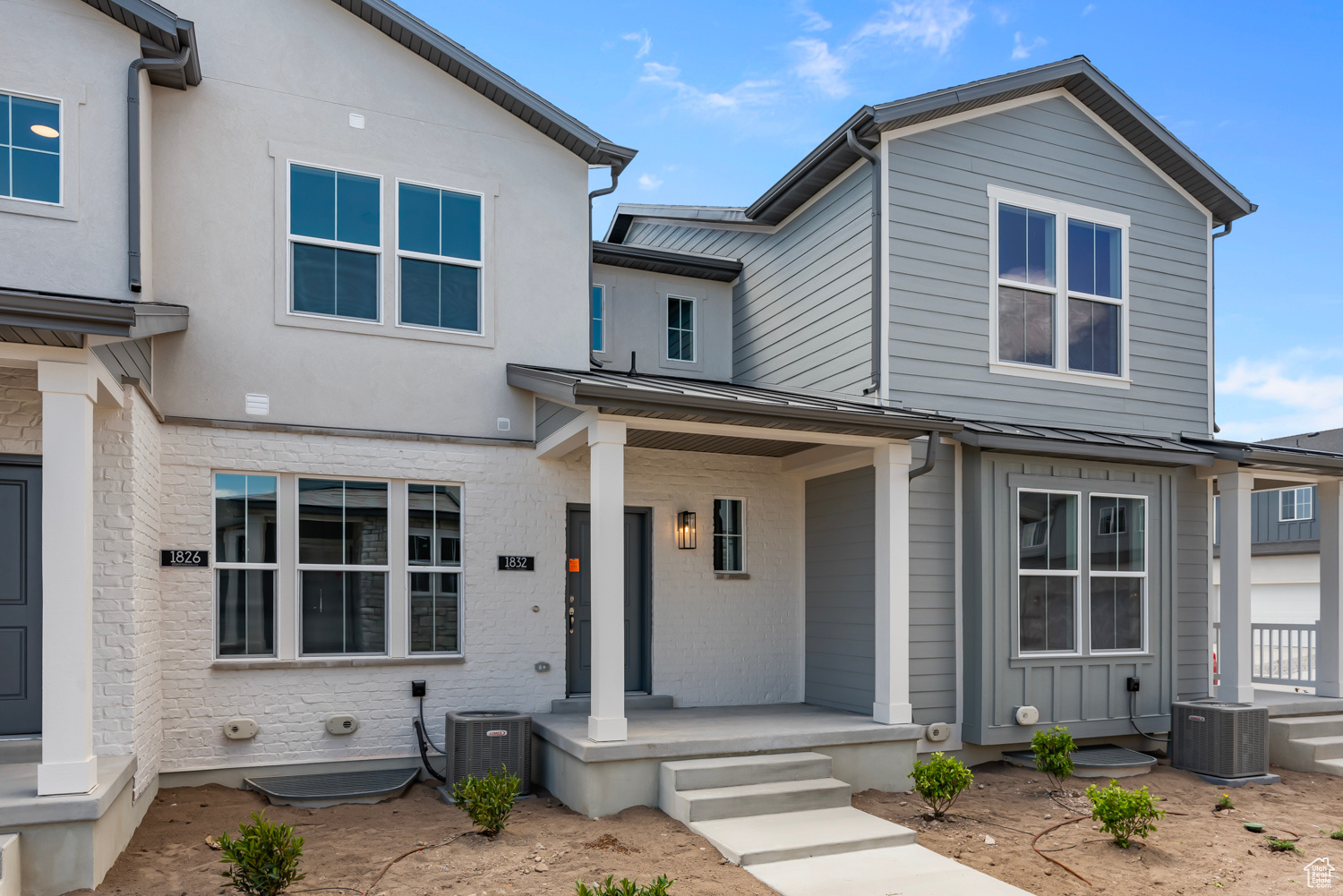 View of front of property featuring central AC unit