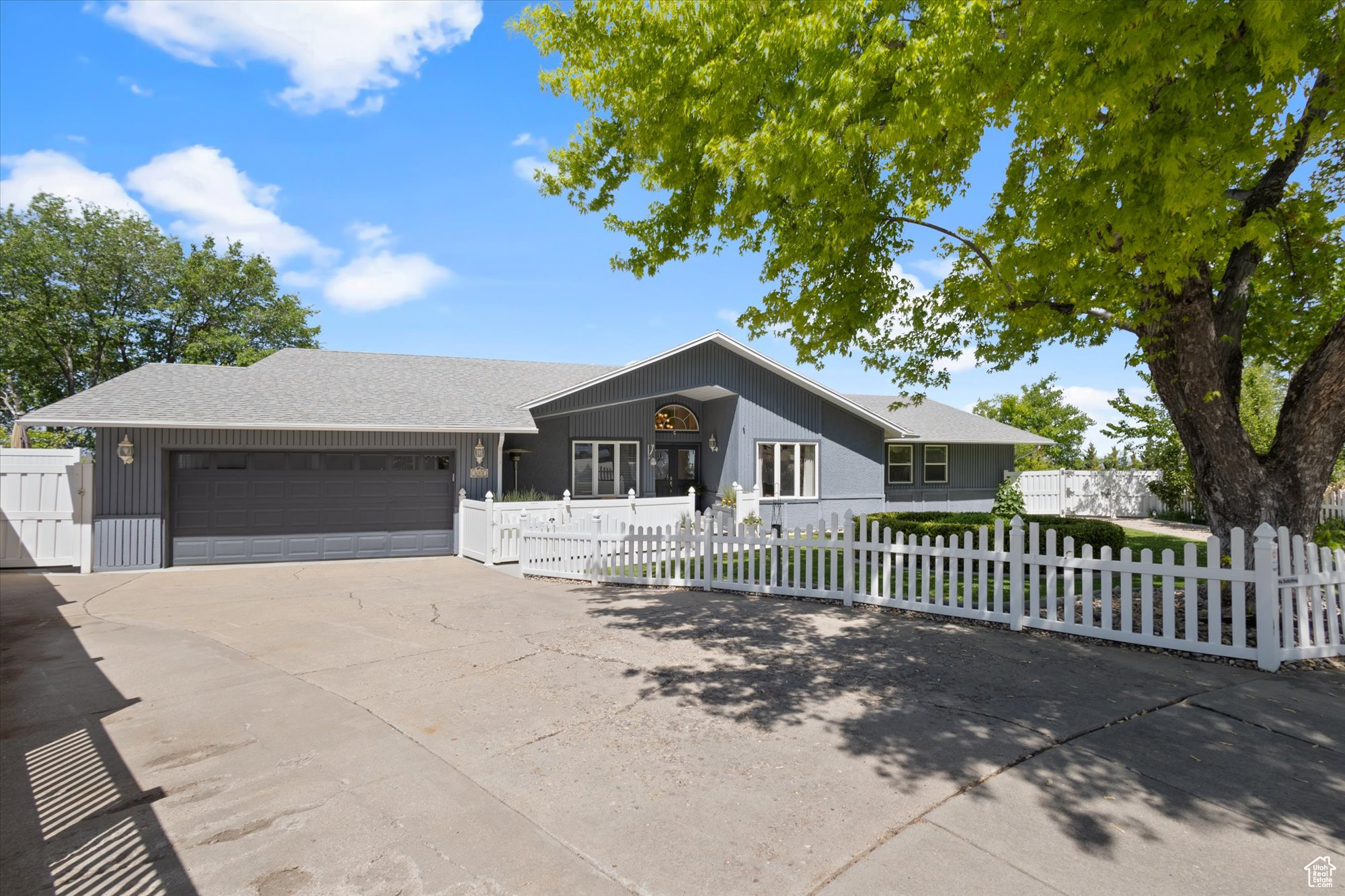 Ranch-style home featuring a garage