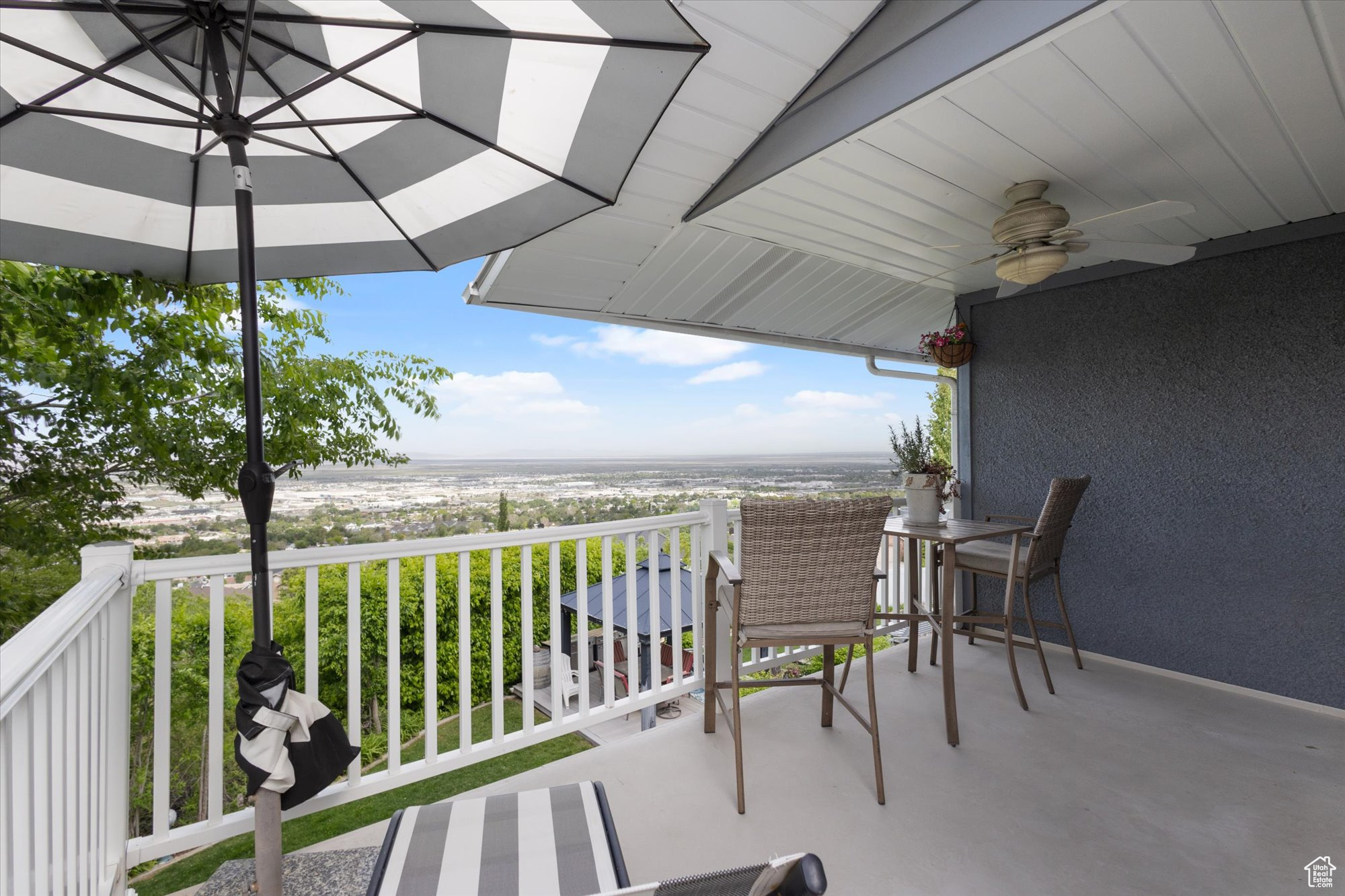 Balcony featuring ceiling fan