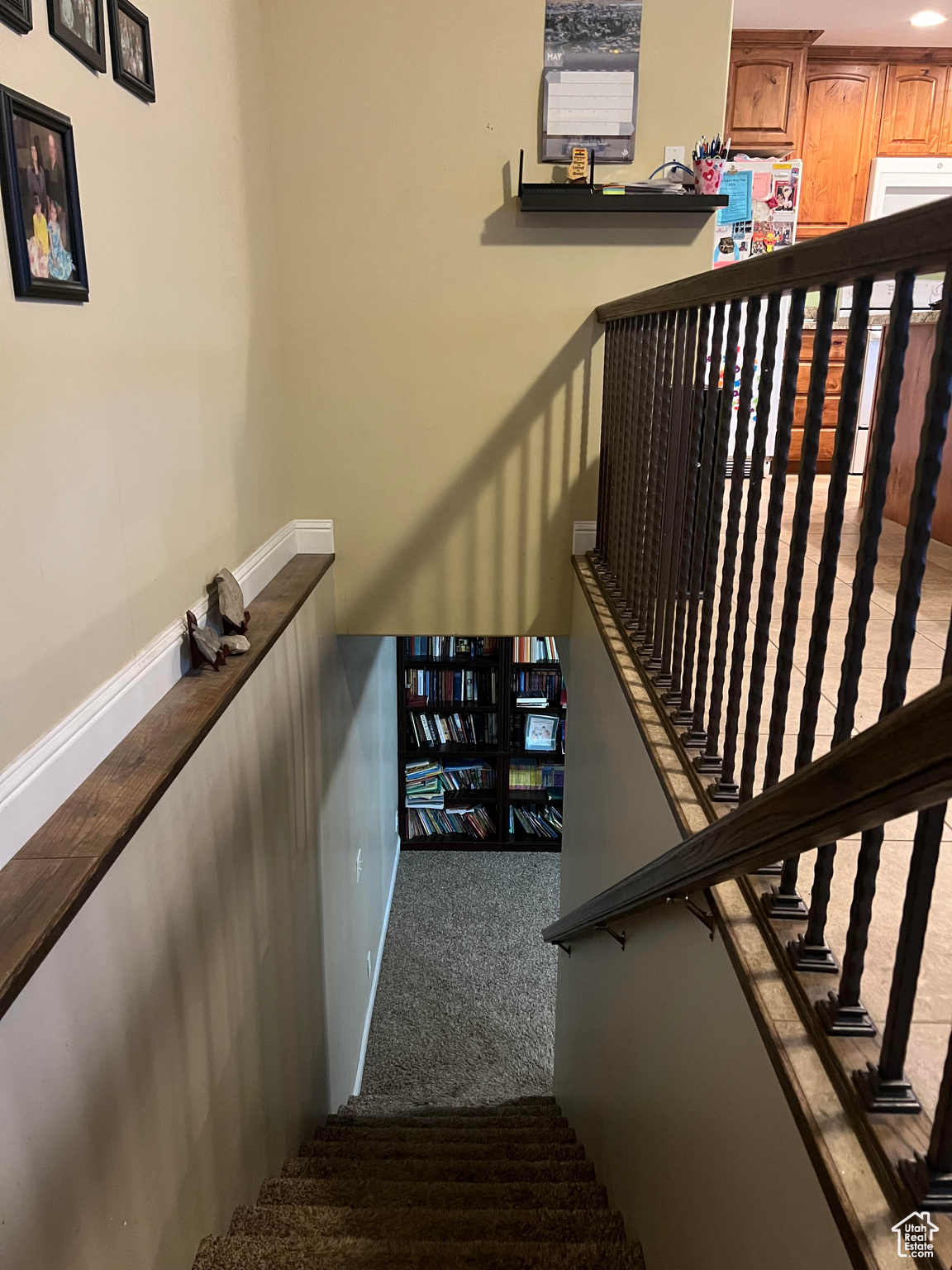 Staircase with dark carpet