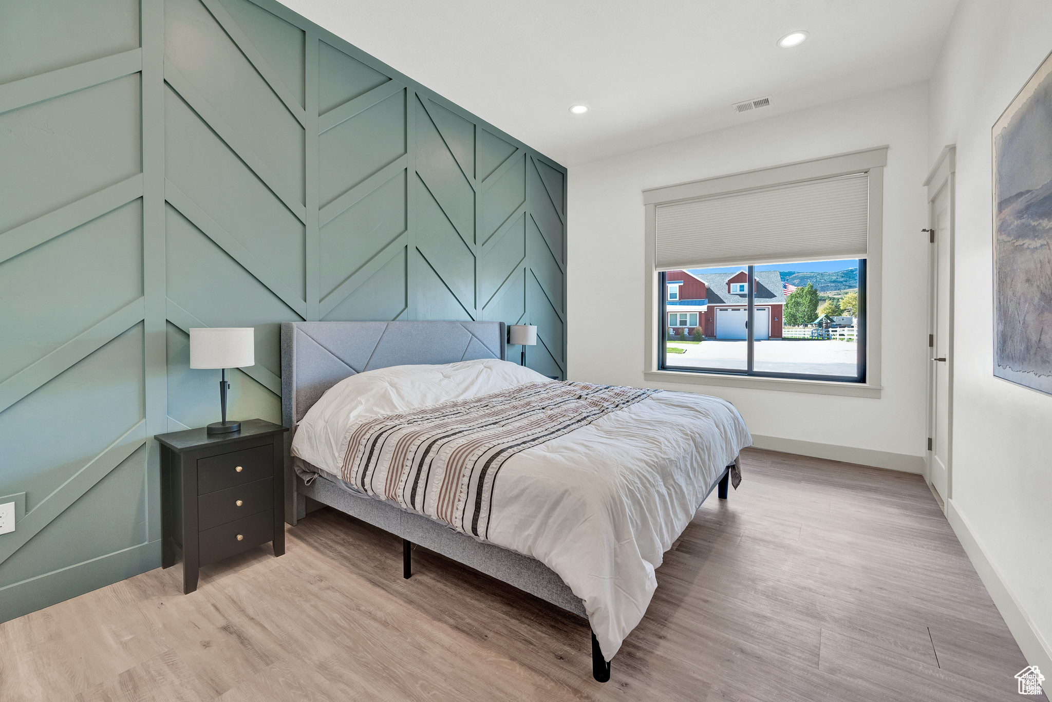 Bedroom featuring light hardwood / wood-style floors