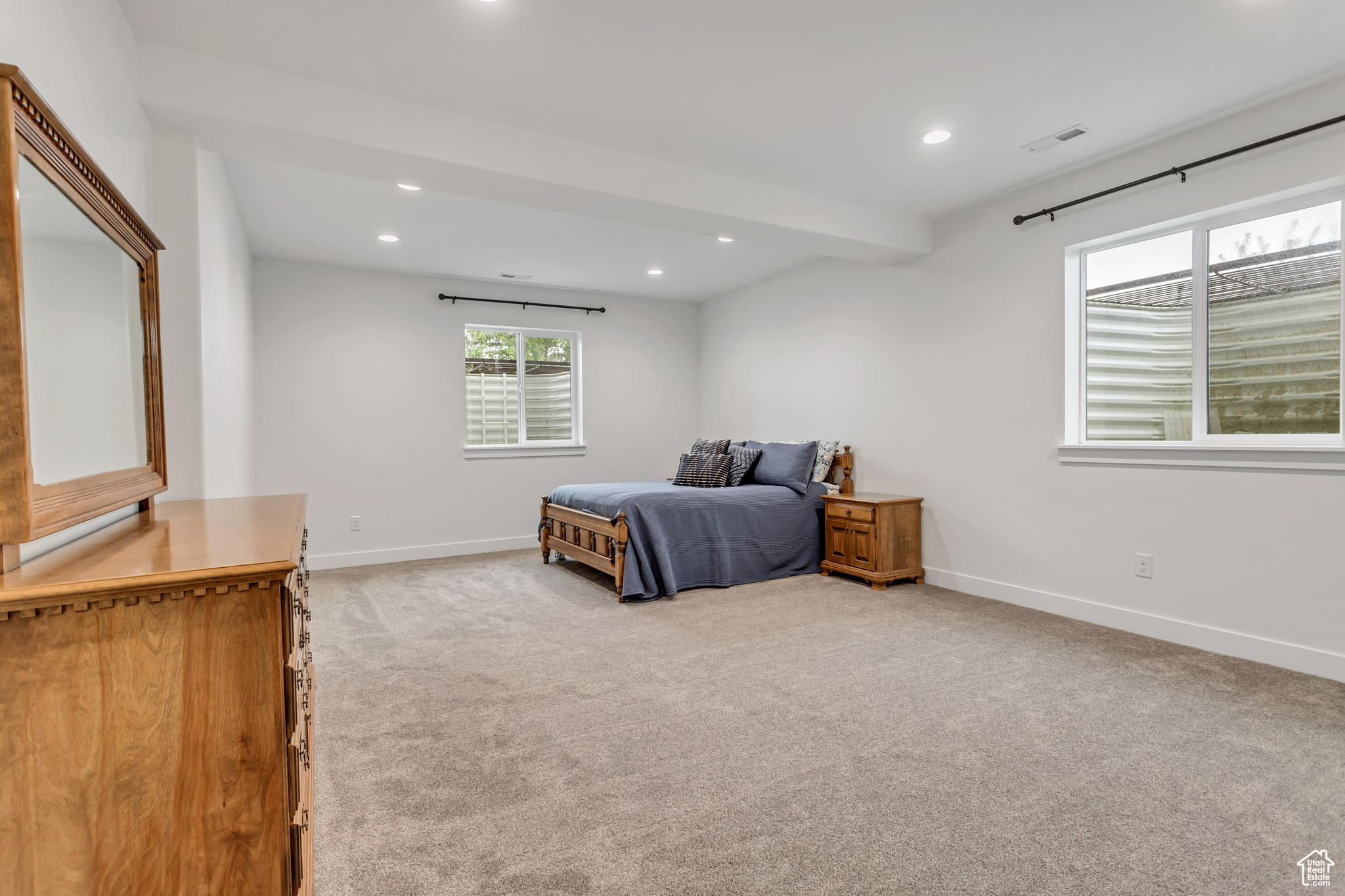 Spacious carpeted  basement bedroom nearby a full bath