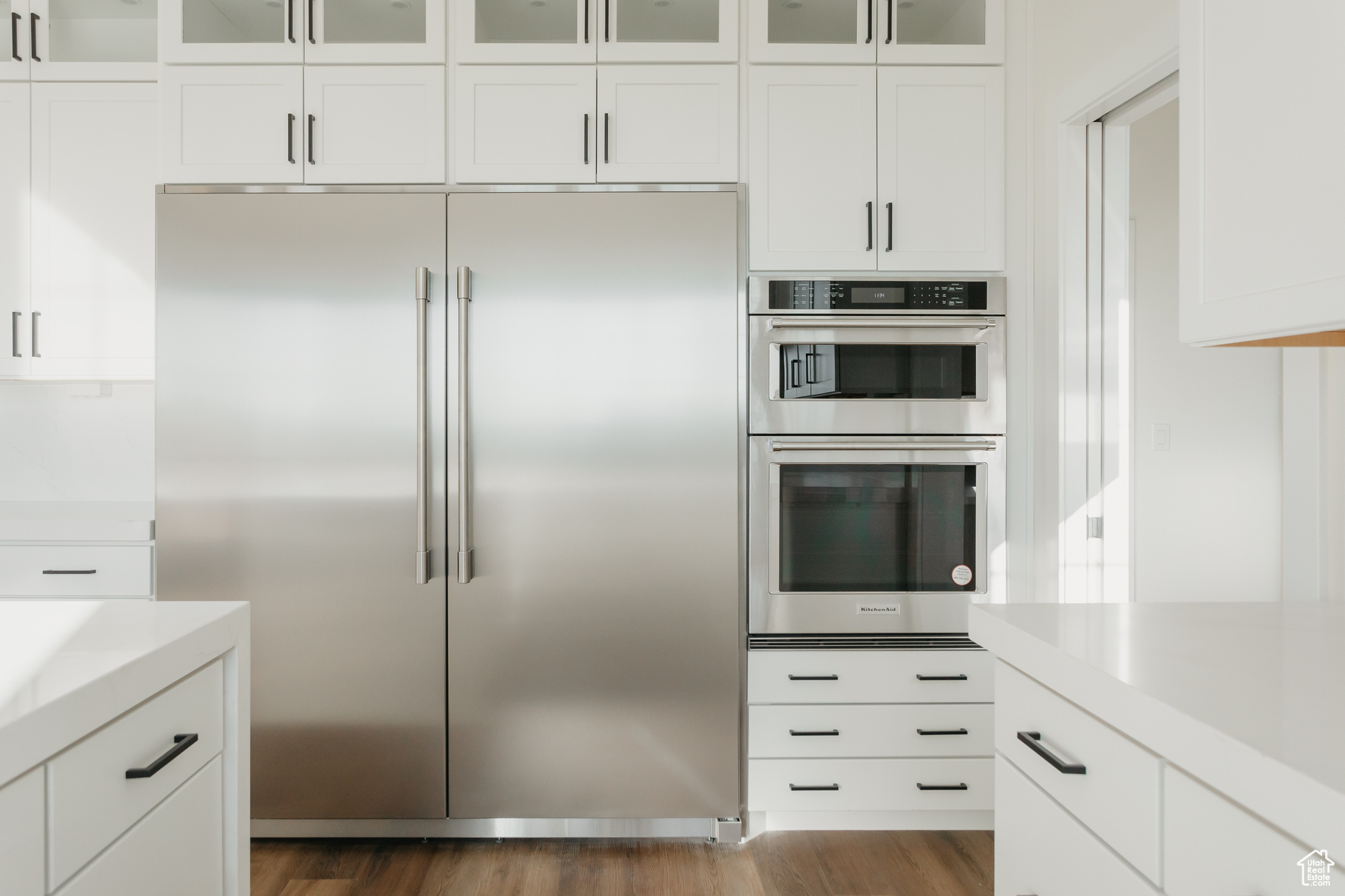 Kitchen featuring white cabinets, stainless steel appliances, microwave/convection oven & large lower oven