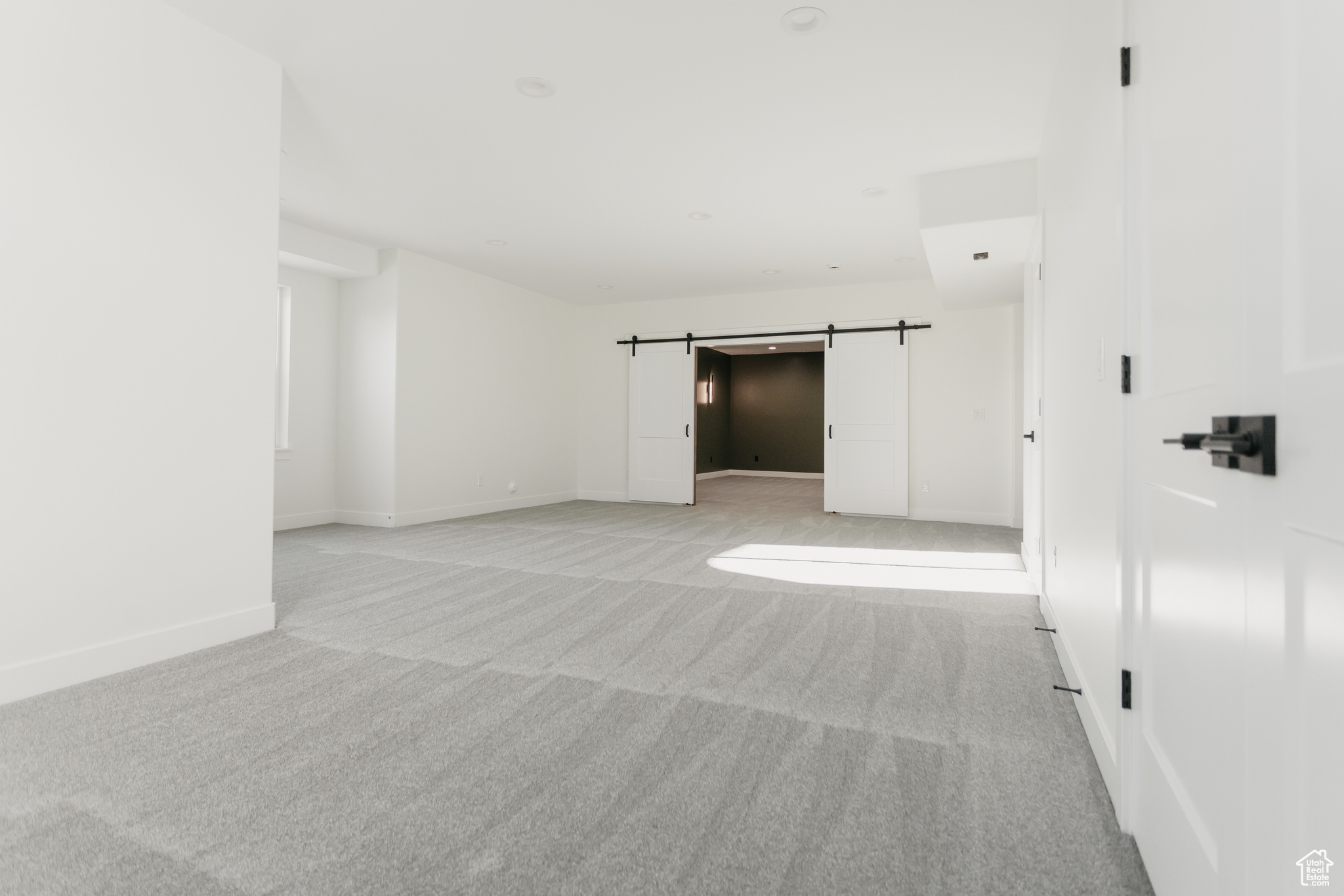 Basement rec room looking to entrance to theater room