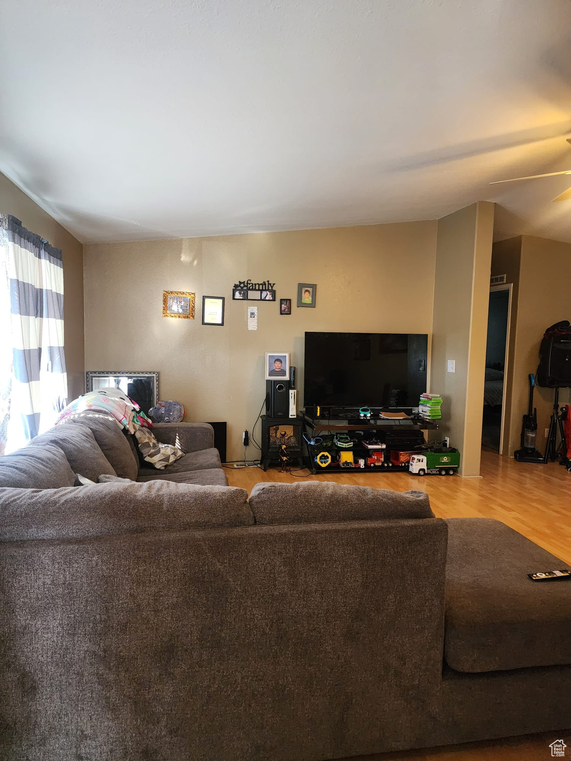 Living room with hardwood / wood-style floors