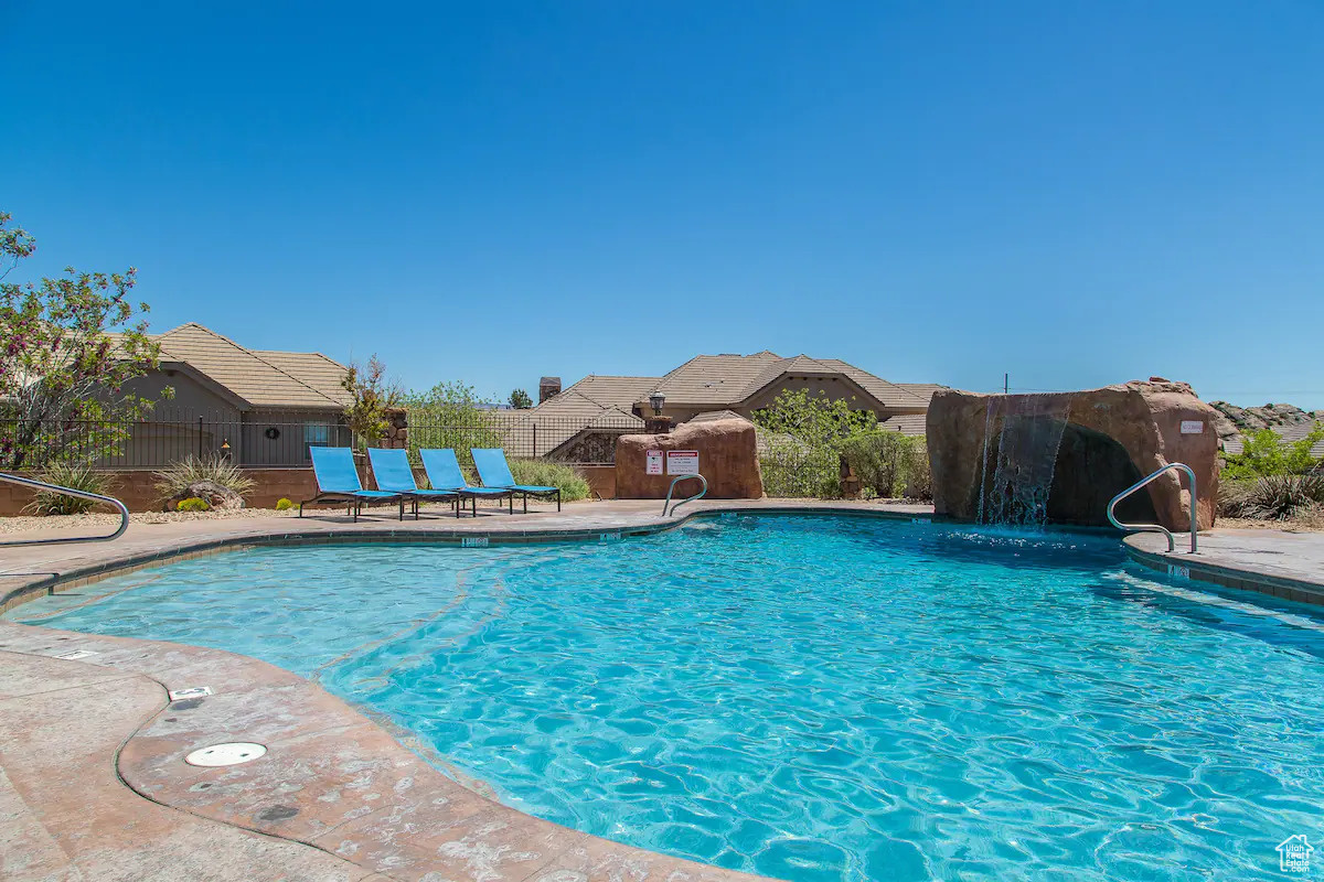 View of pool featuring pool water feature