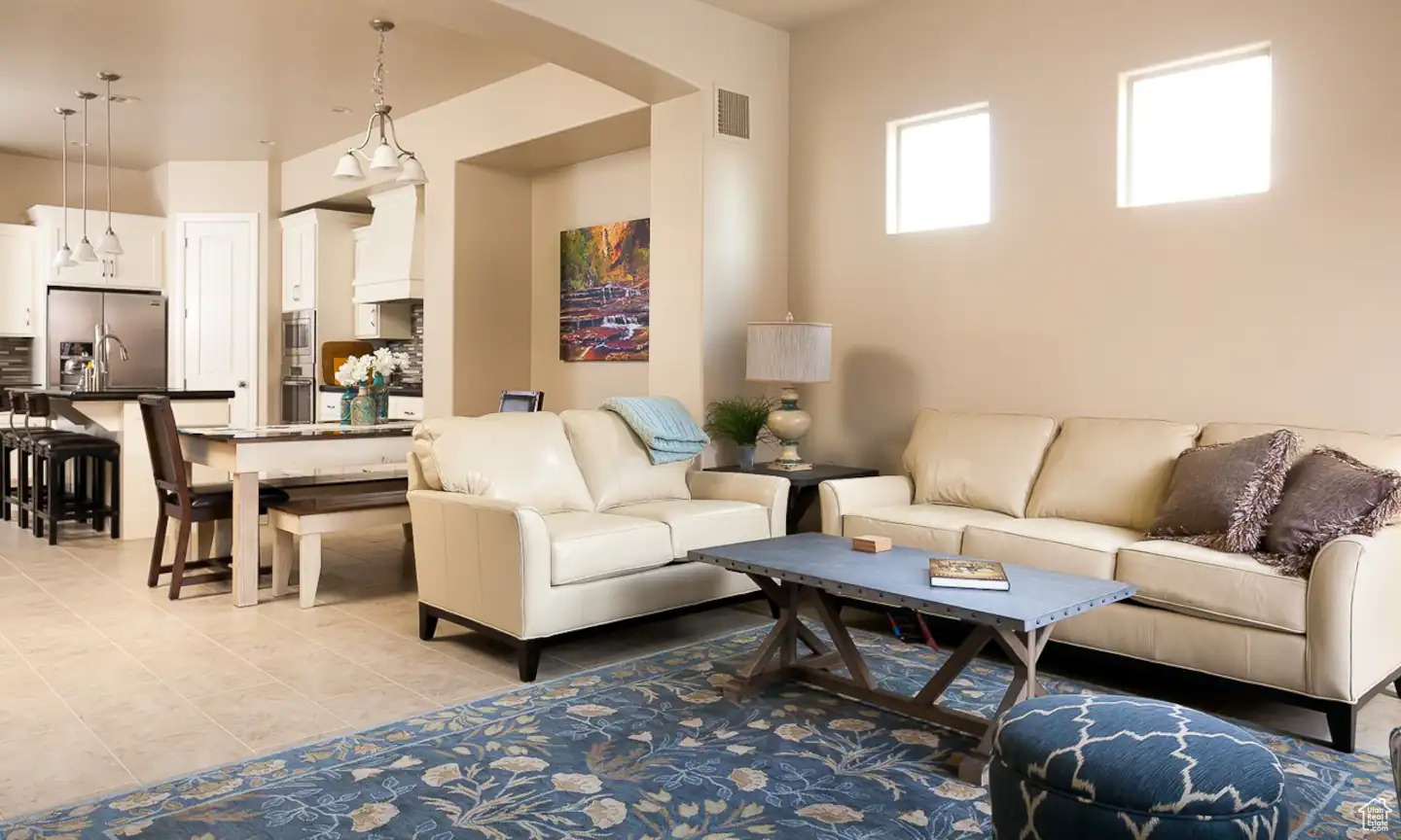 Living room with light tile flooring