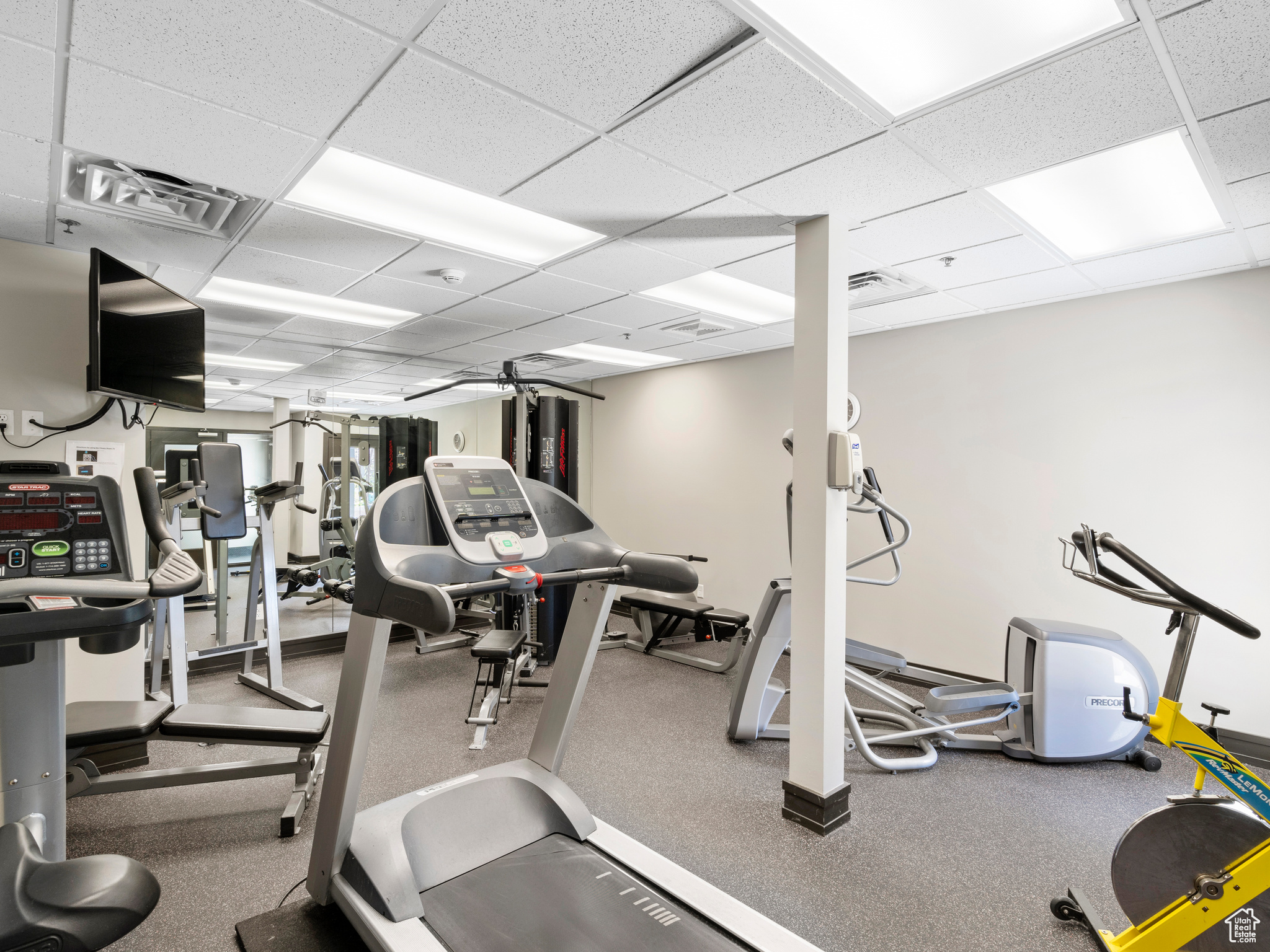 Exercise room with a drop ceiling