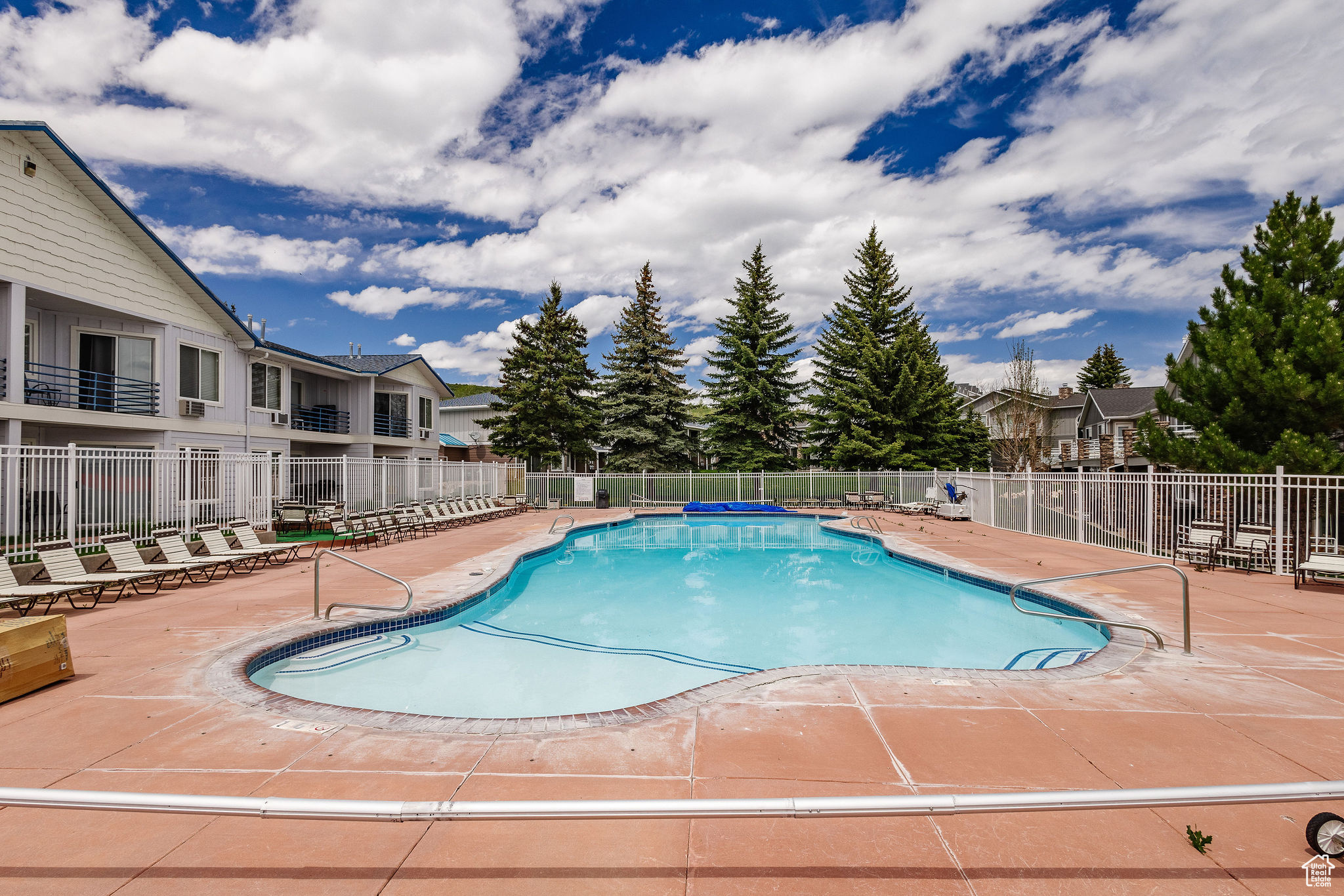 View of swimming pool featuring a patio