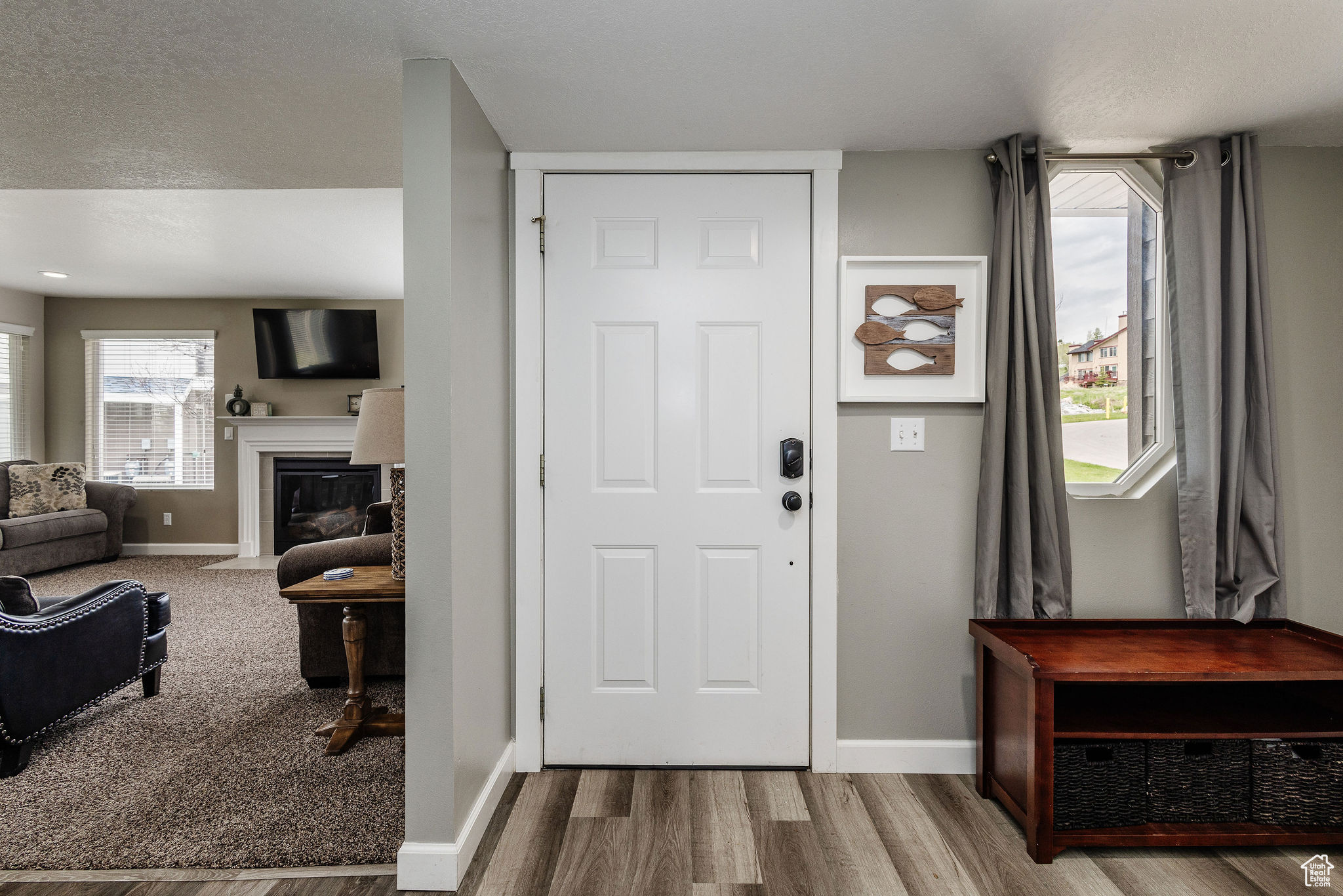 Entrance foyer featuring hardwood / wood-style flooring