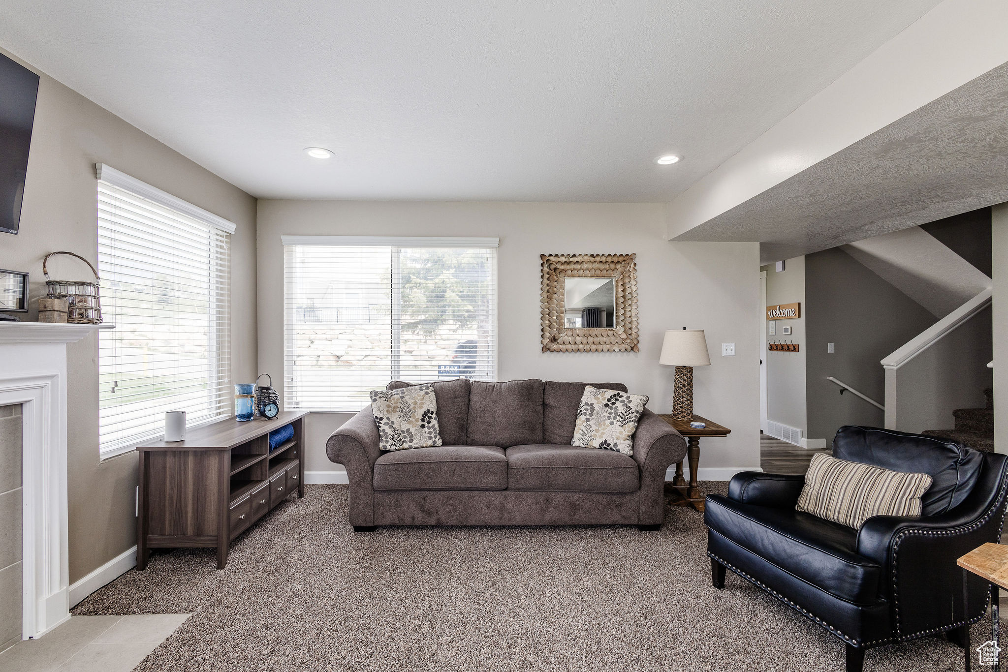 Living room featuring carpet flooring