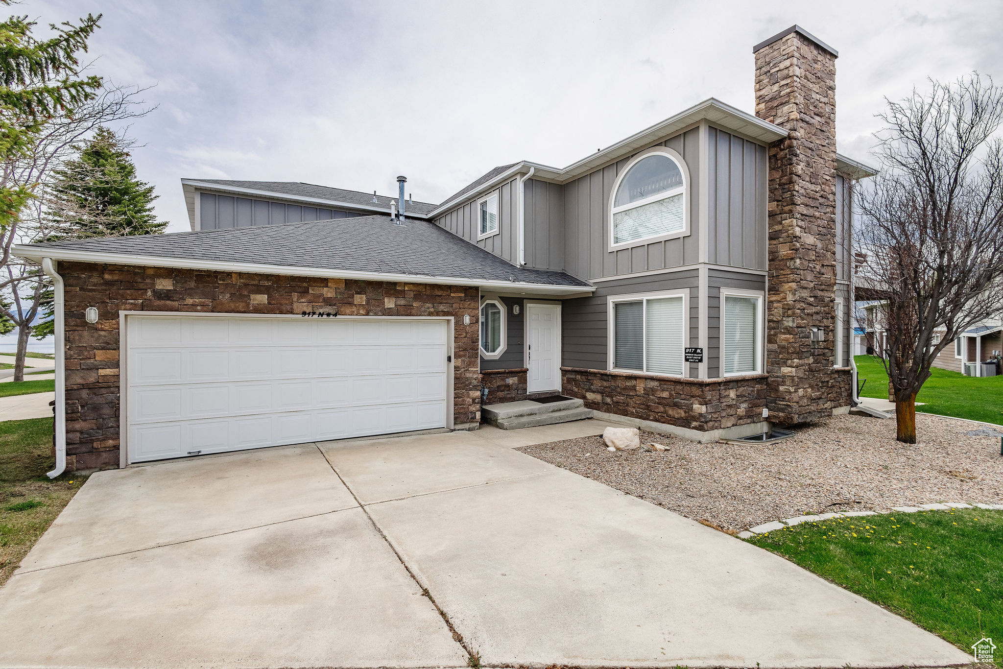 View of property featuring a garage