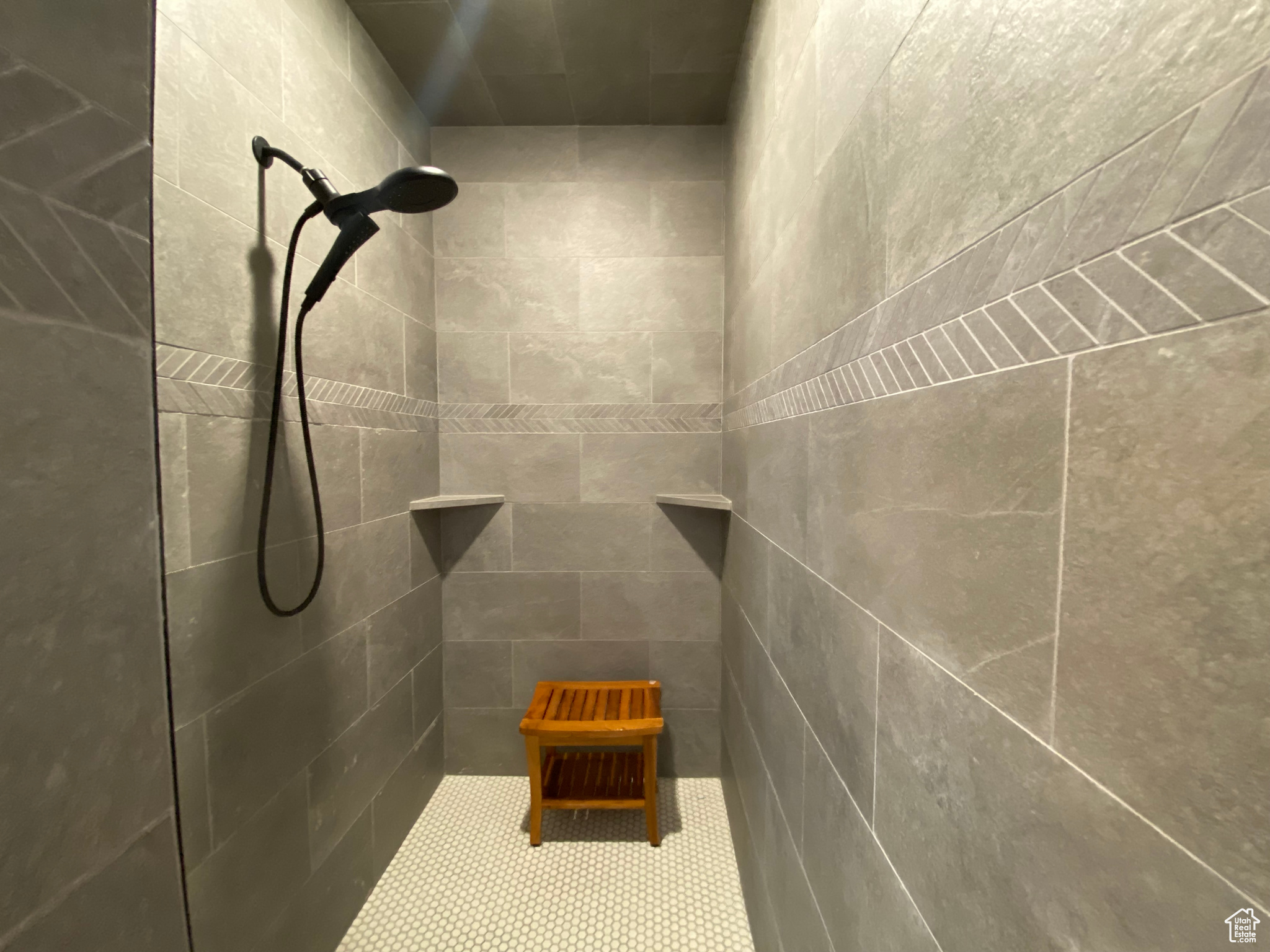 Bathroom featuring tiled shower