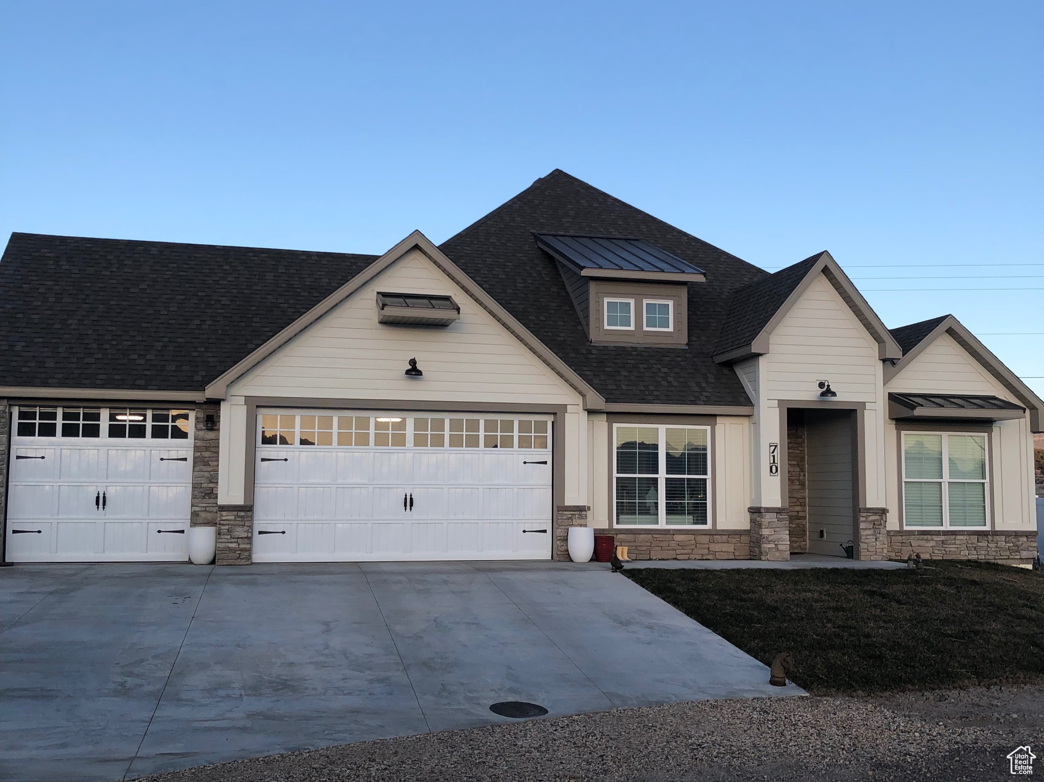 View of front of property with a garage