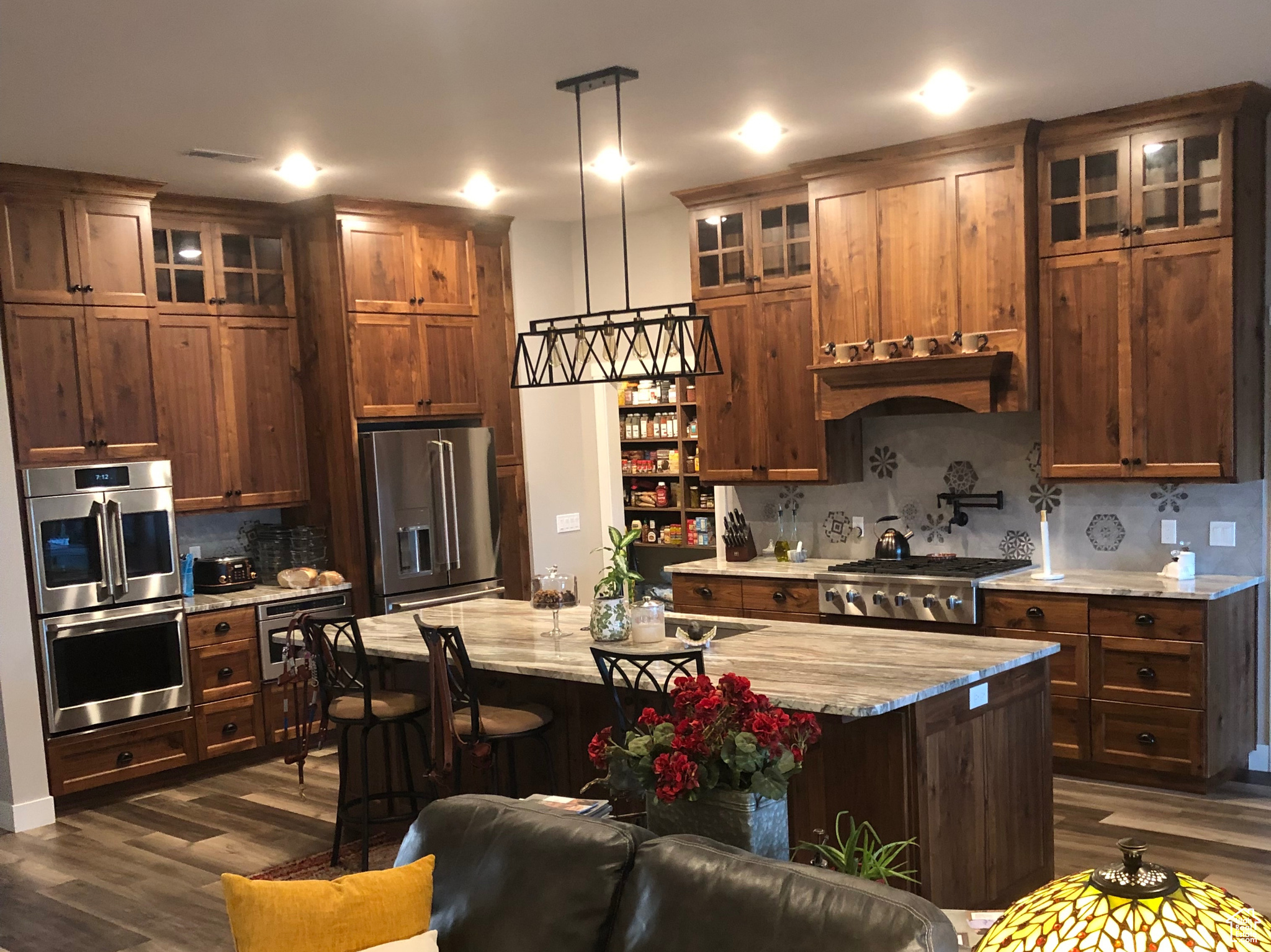 Living room with dark wood-type flooring