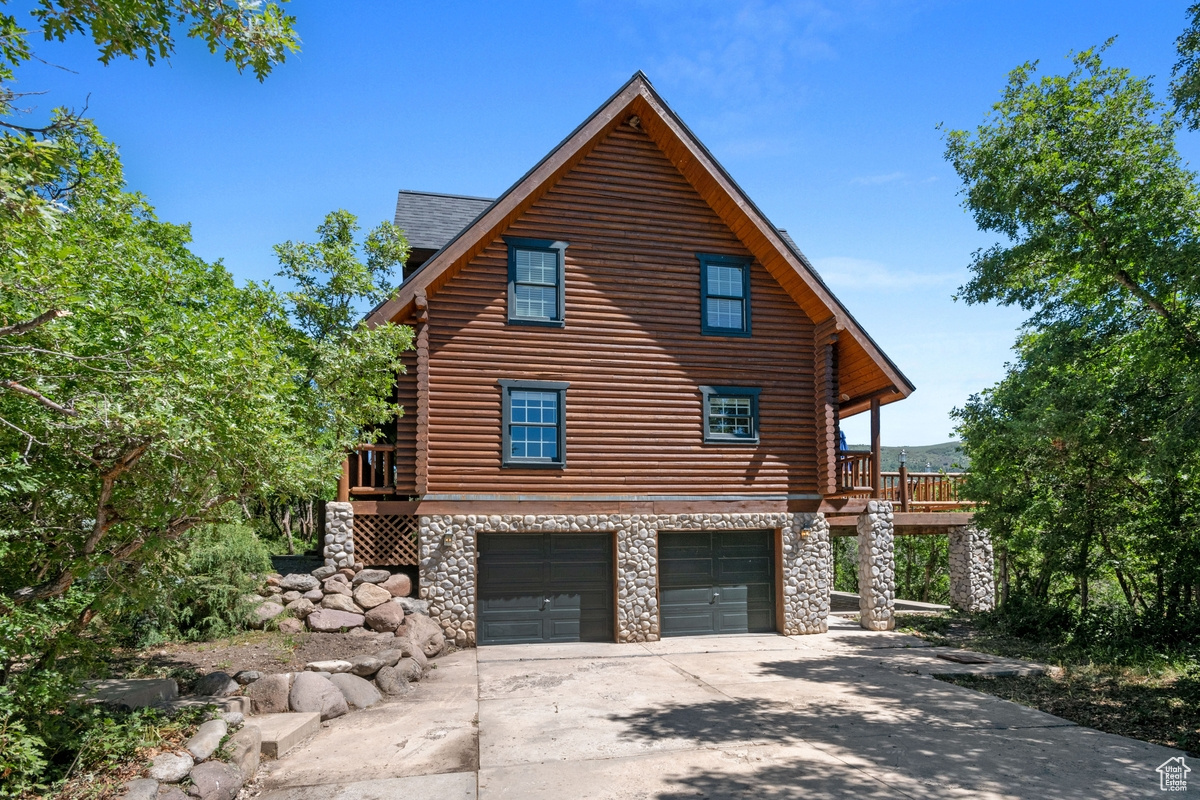 Rare long driveway & 2 car garage.