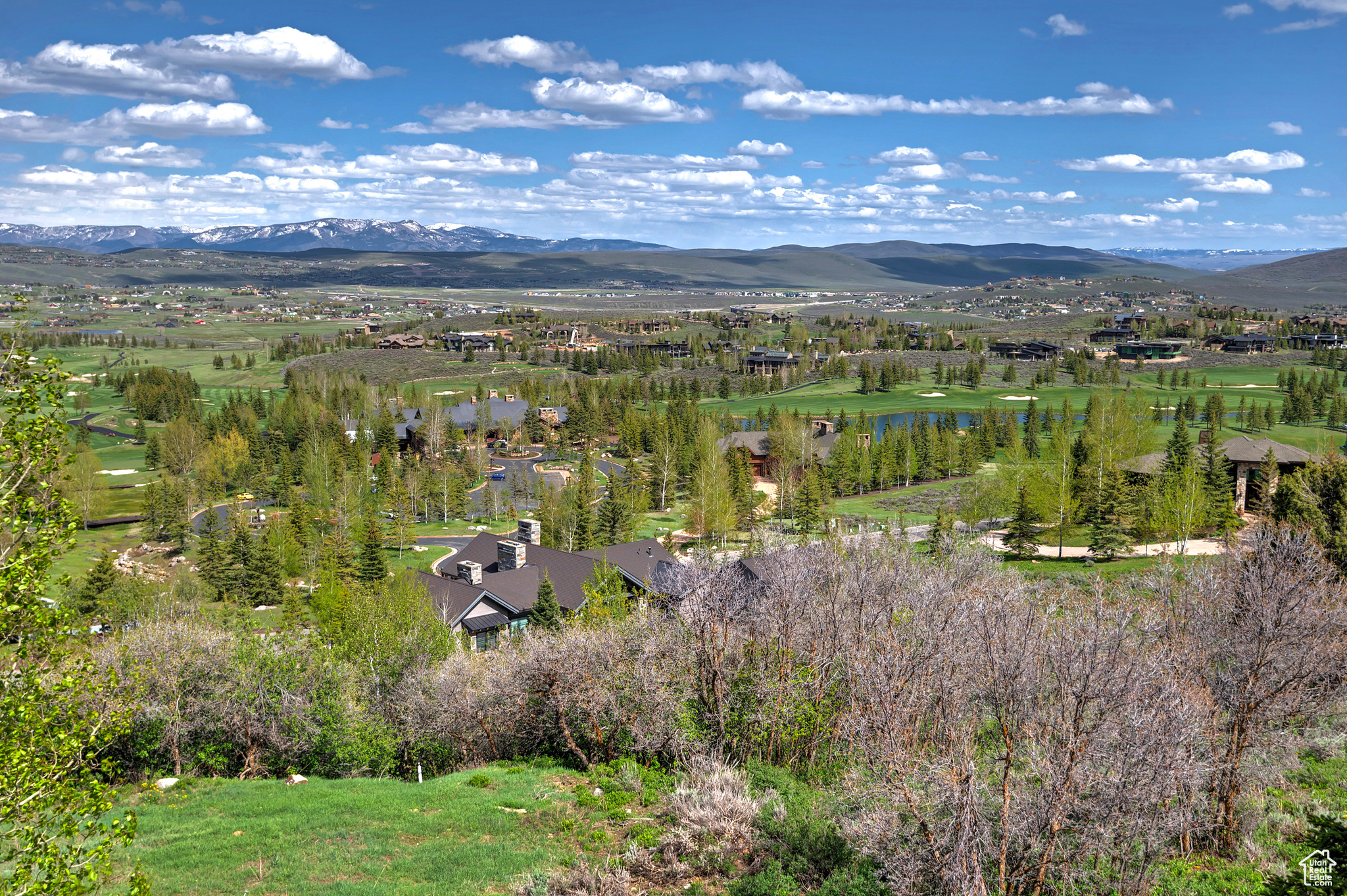 Drone Aerial View of the Golf Course & Mountains Beyond