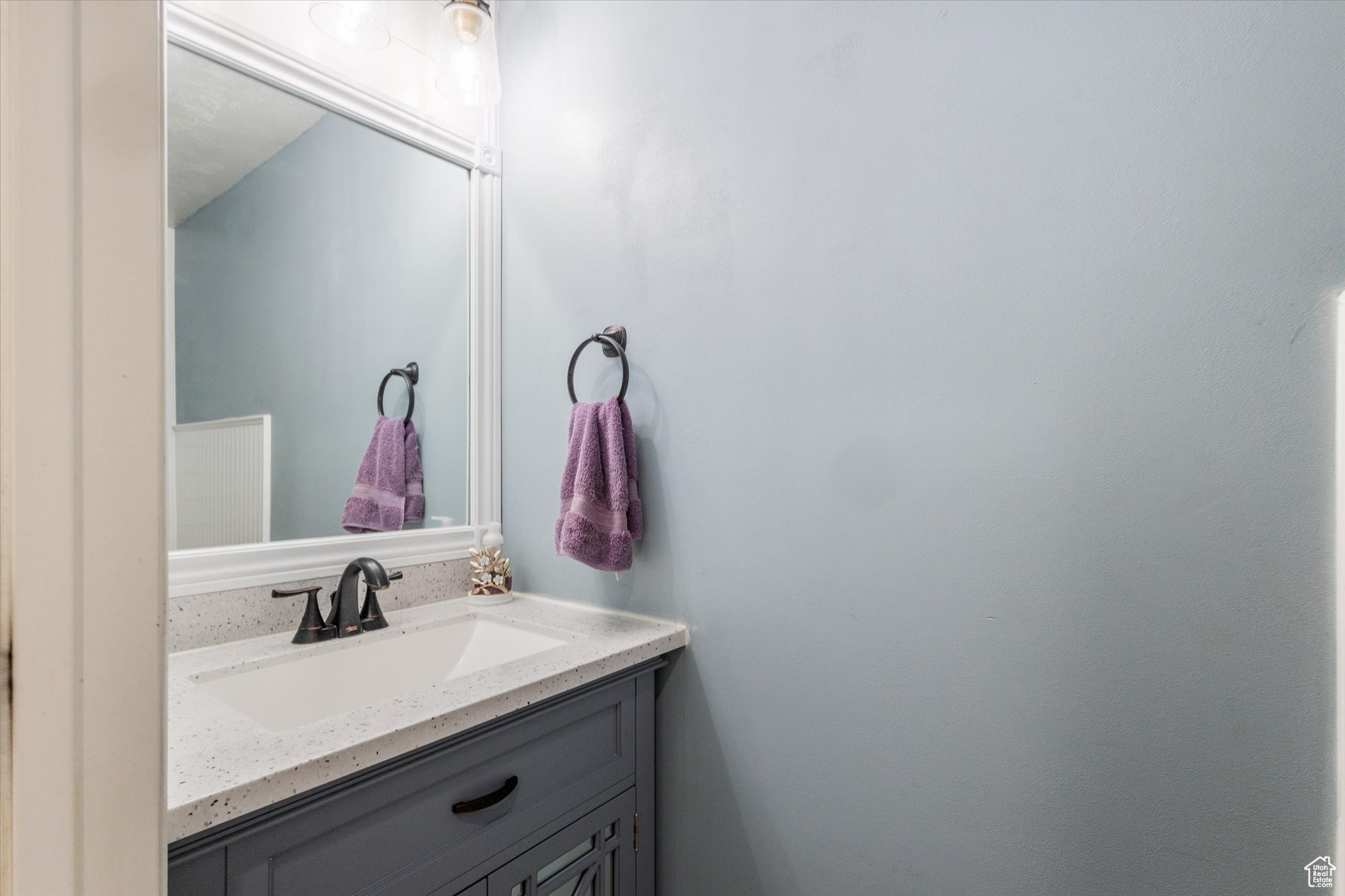 Bathroom featuring vanity