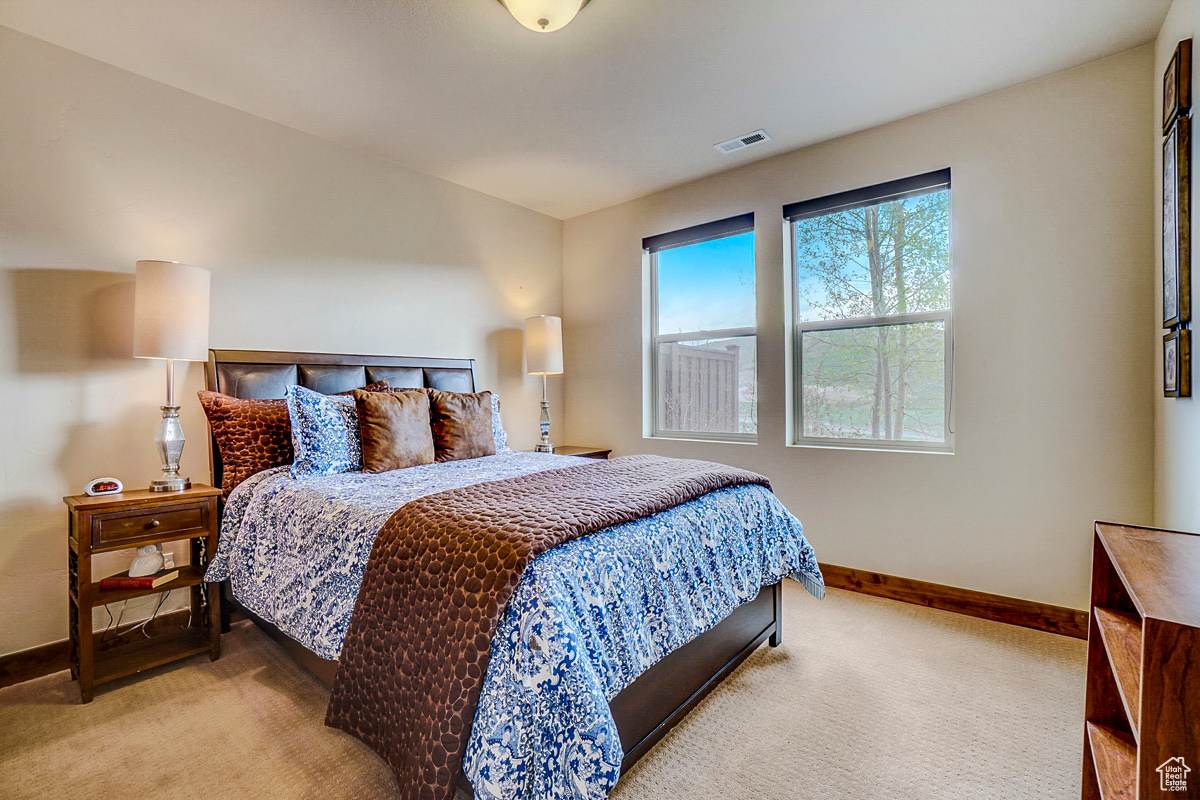 View of carpeted bedroom