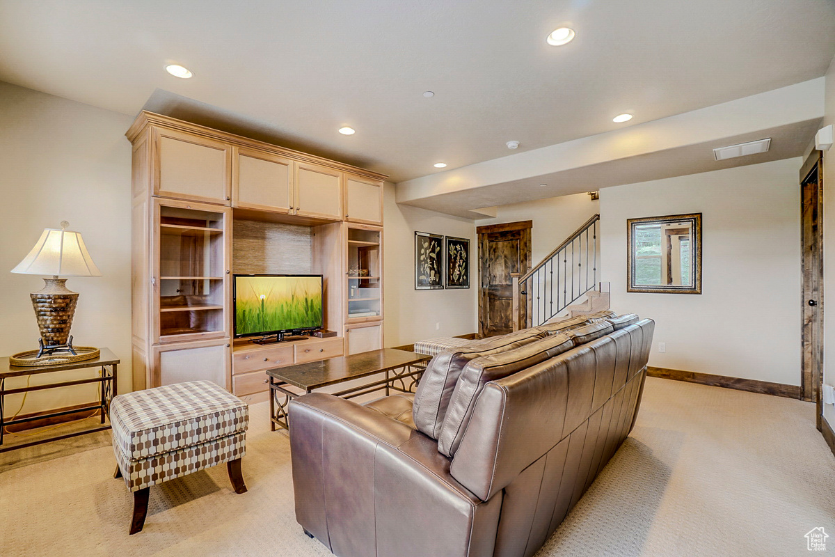 Living room with light carpet