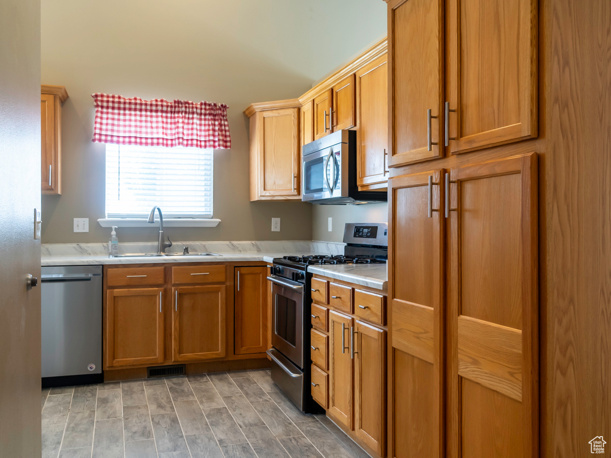 Kitchen featuring sink and stainless steel appliances