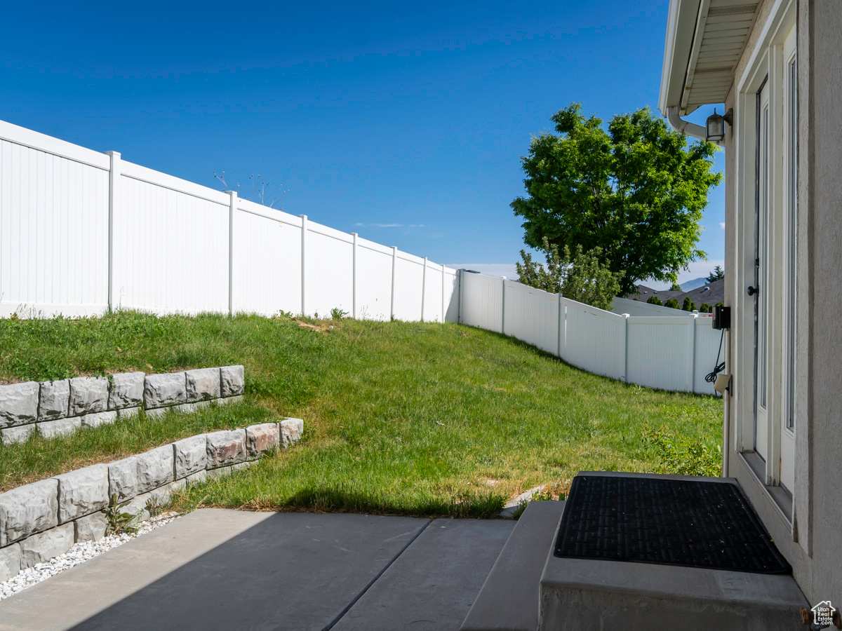 View of yard featuring a patio