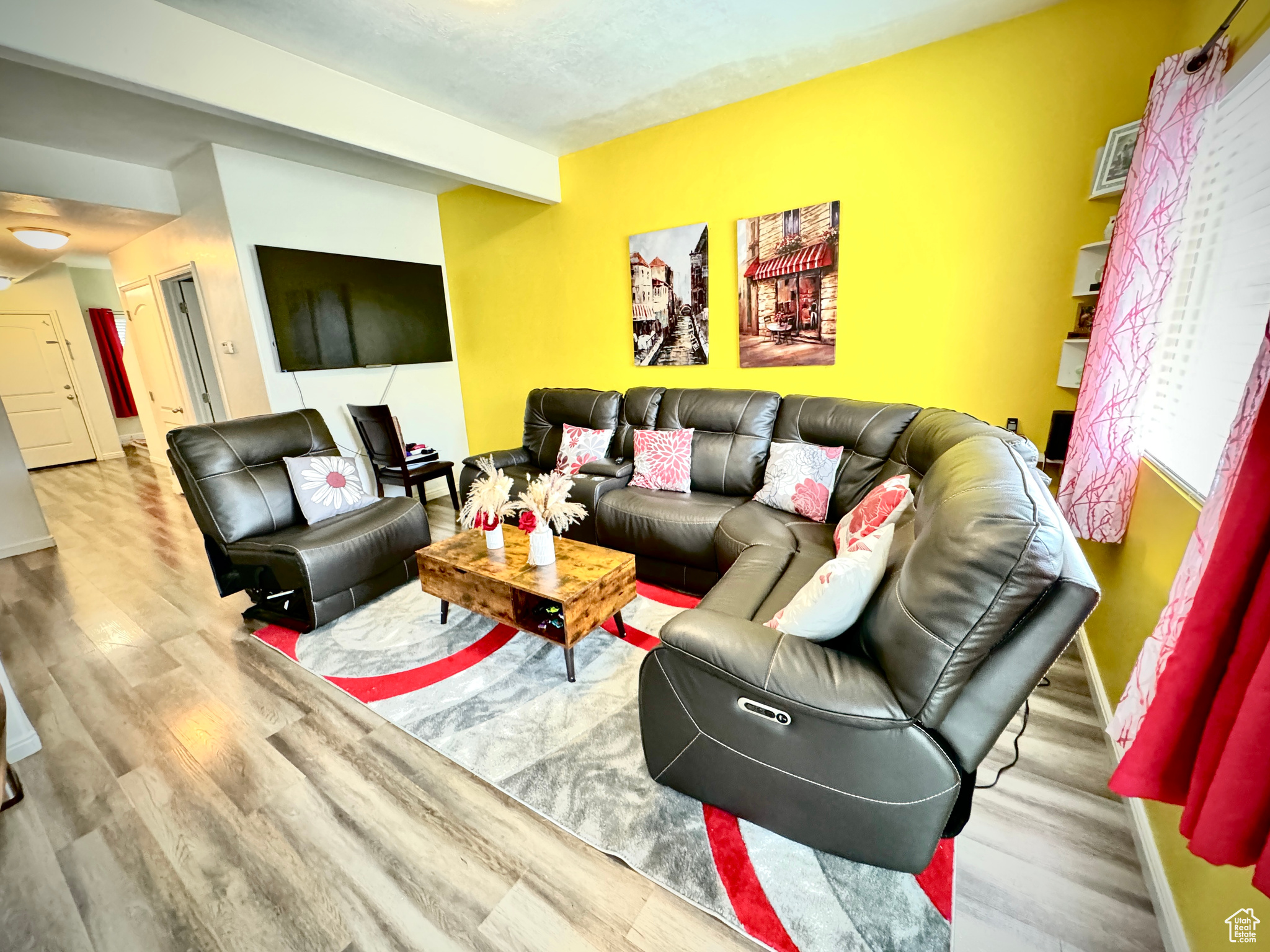 Living room with hardwood / wood-style flooring