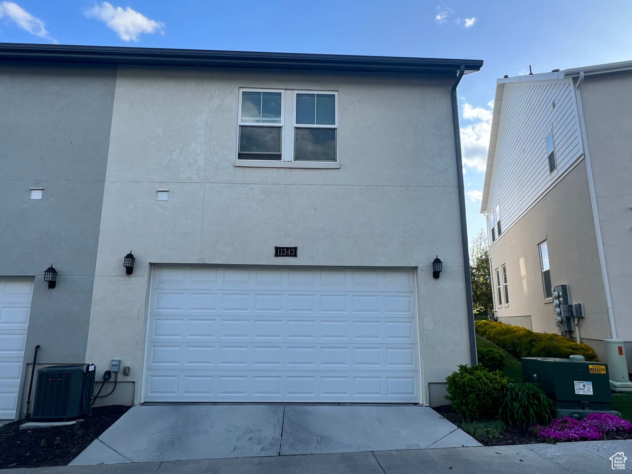 Exterior space featuring a garage