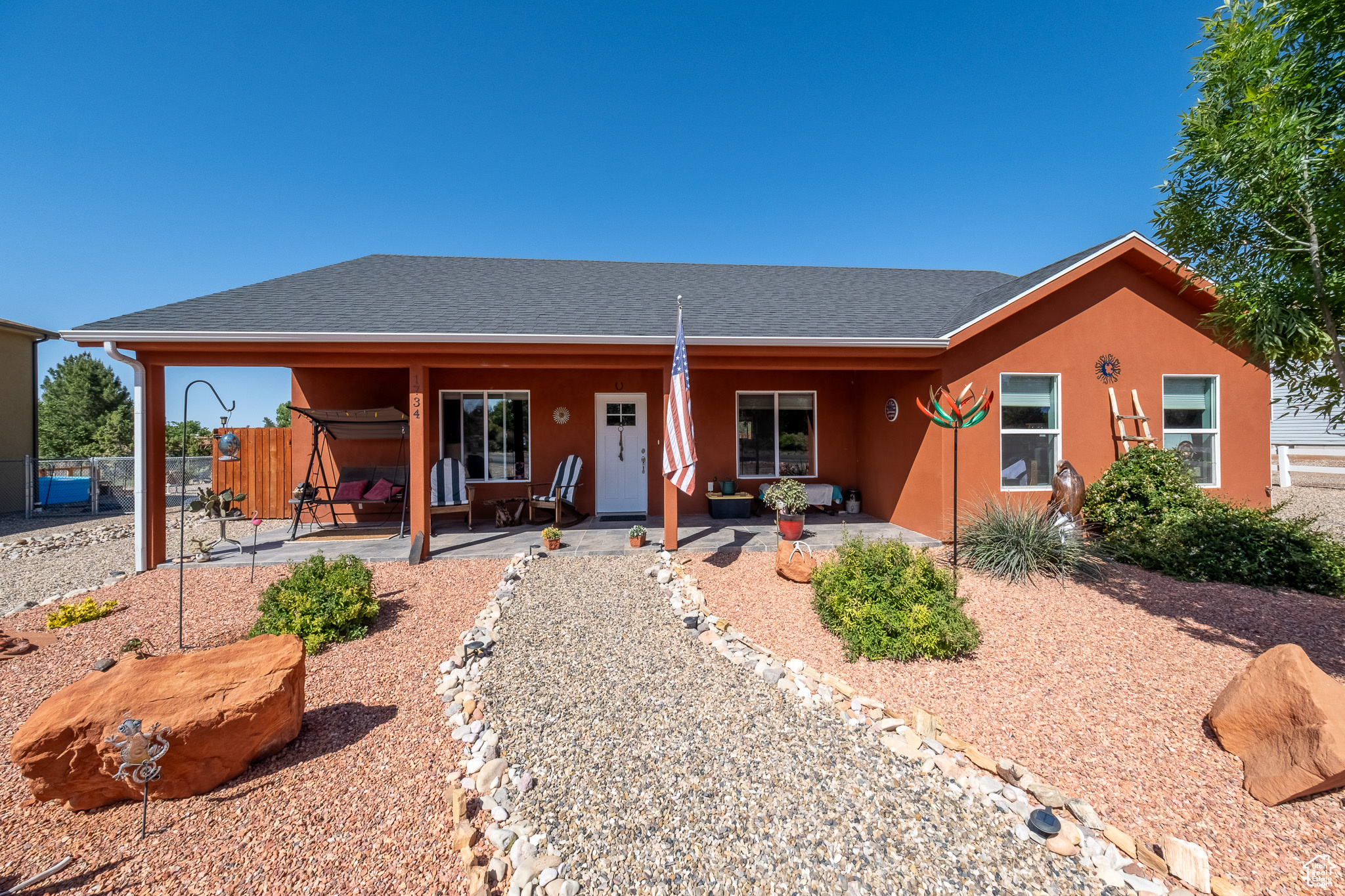 Ranch-style house with a patio area