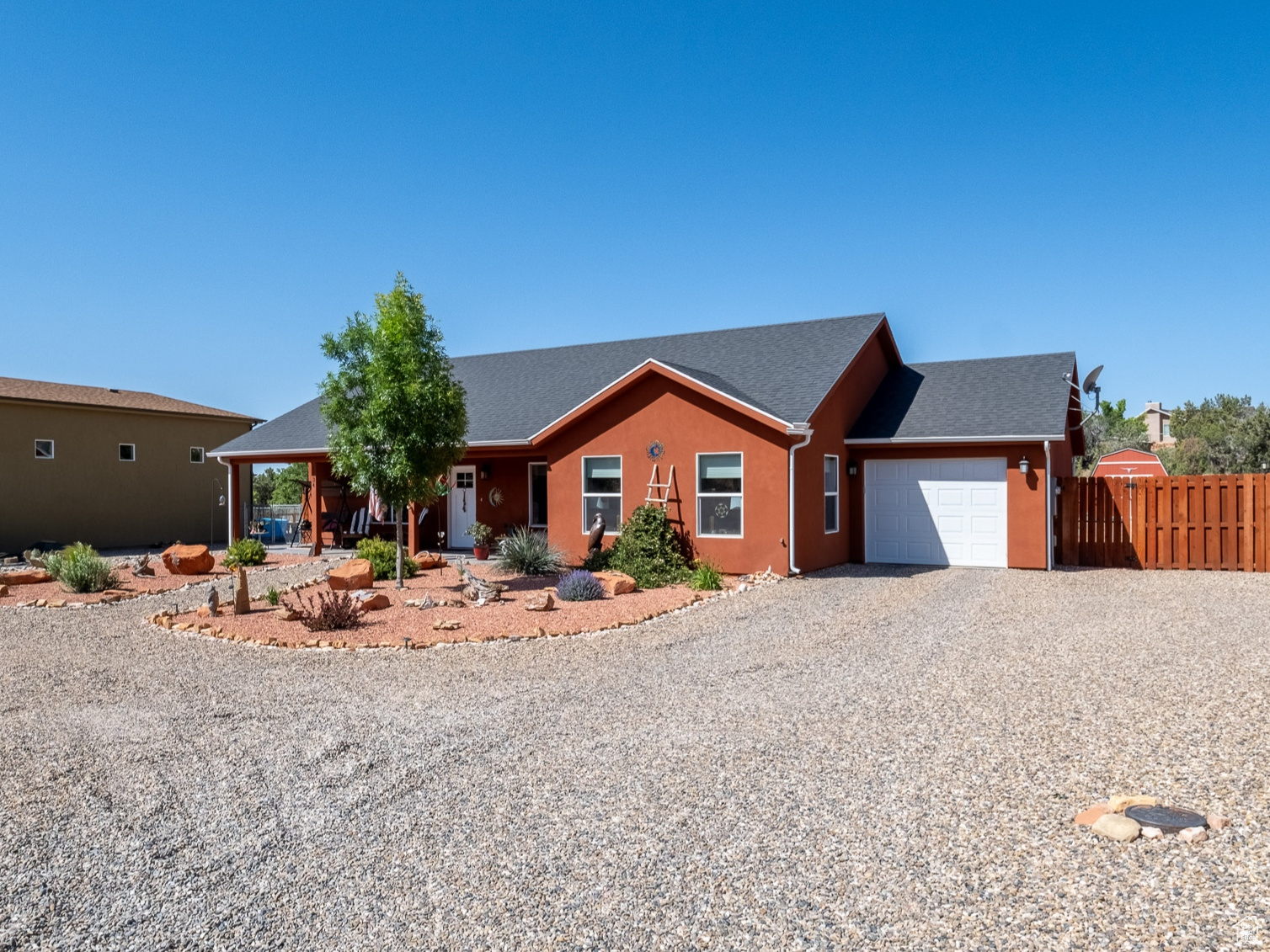 Ranch-style house featuring a garage