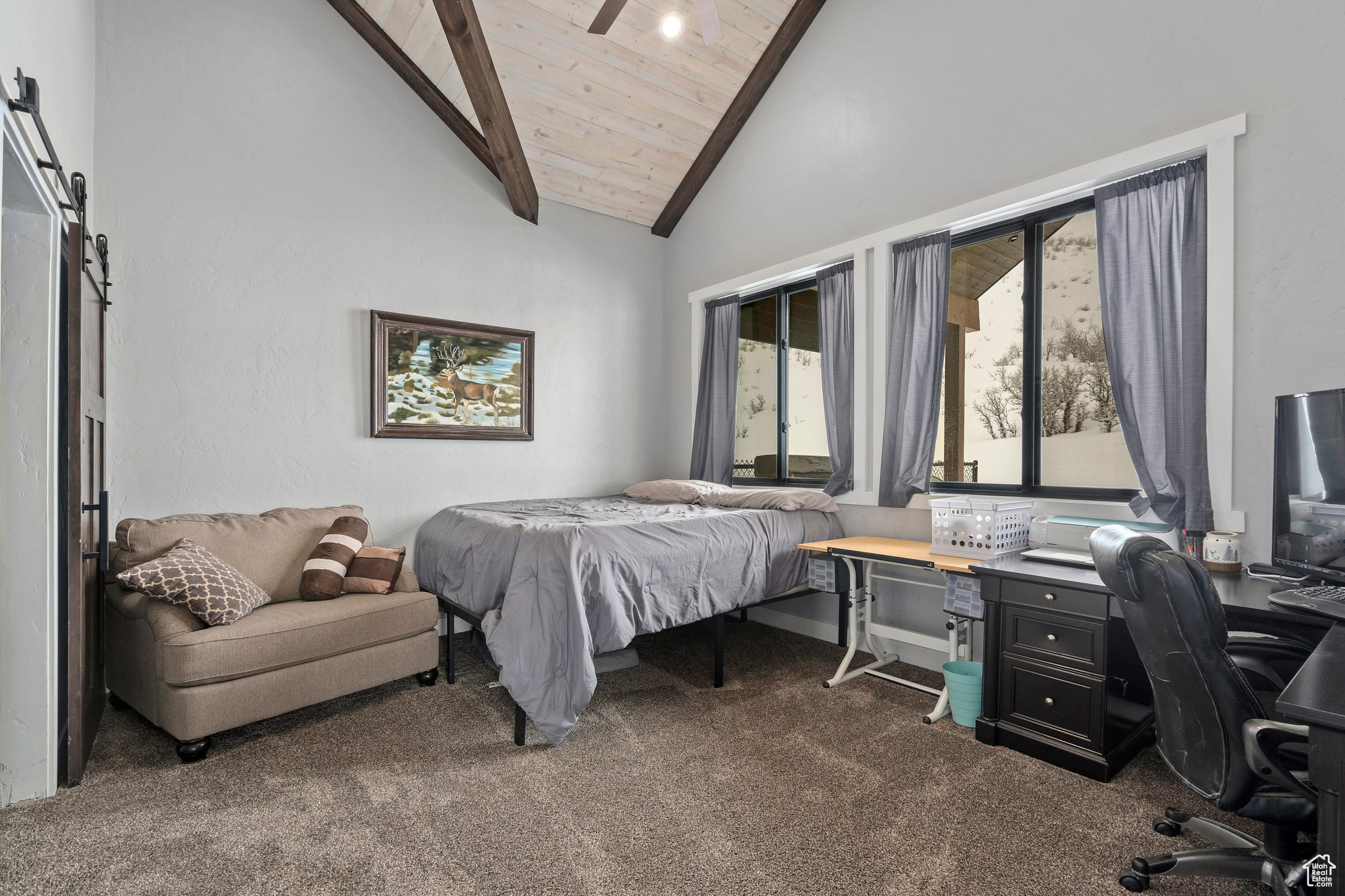 Bedroom featuring high vaulted ceiling, beamed ceiling, carpet floors, and wood ceiling