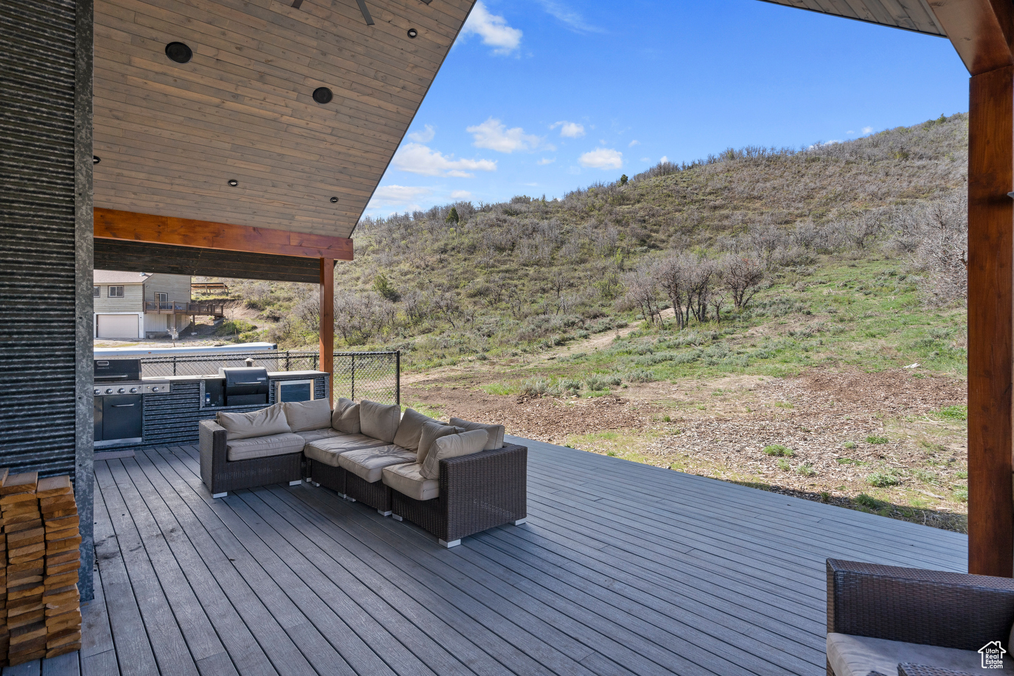 Wooden deck featuring an outdoor hangout area