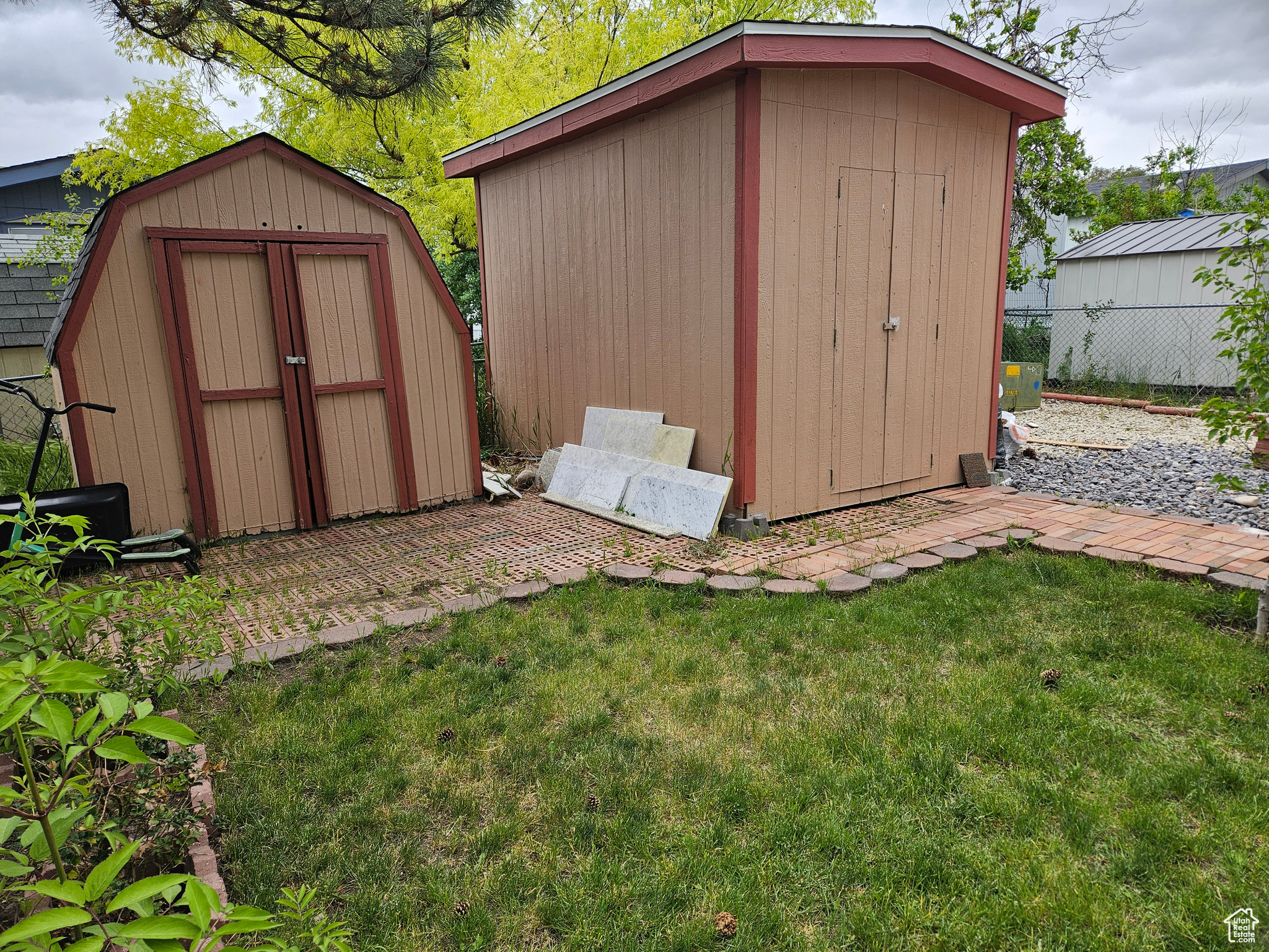 View of shed / structure with a lawn