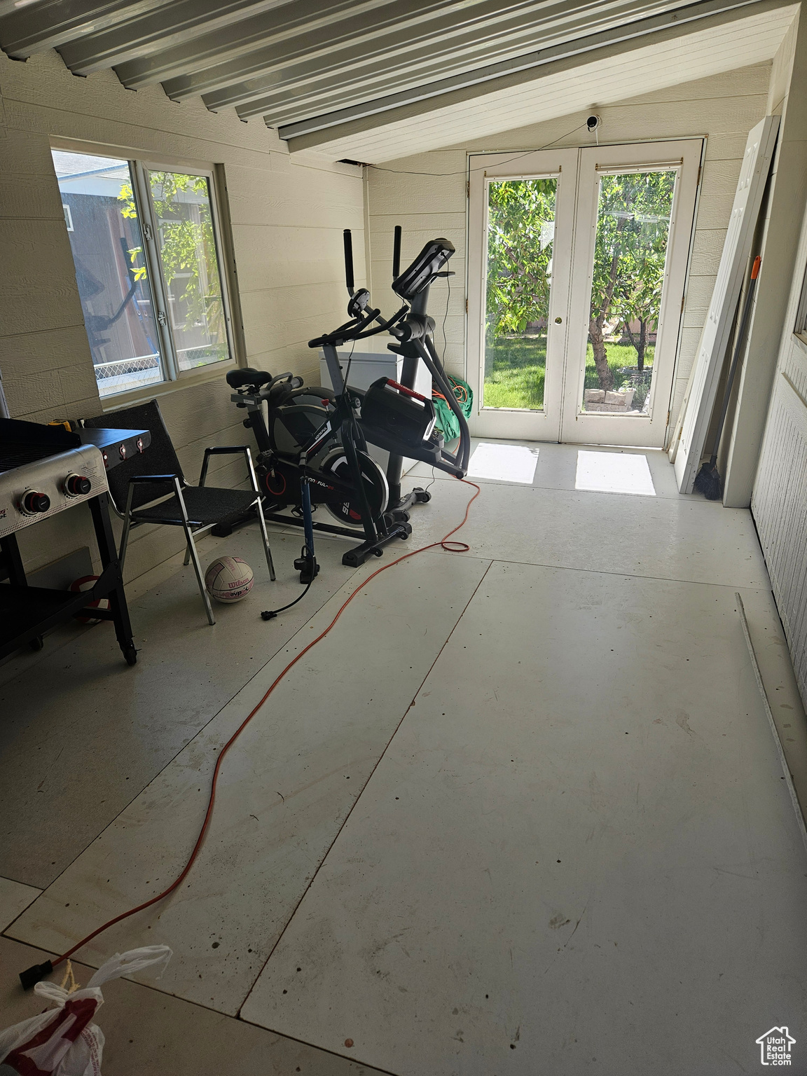 Exercise room with concrete flooring