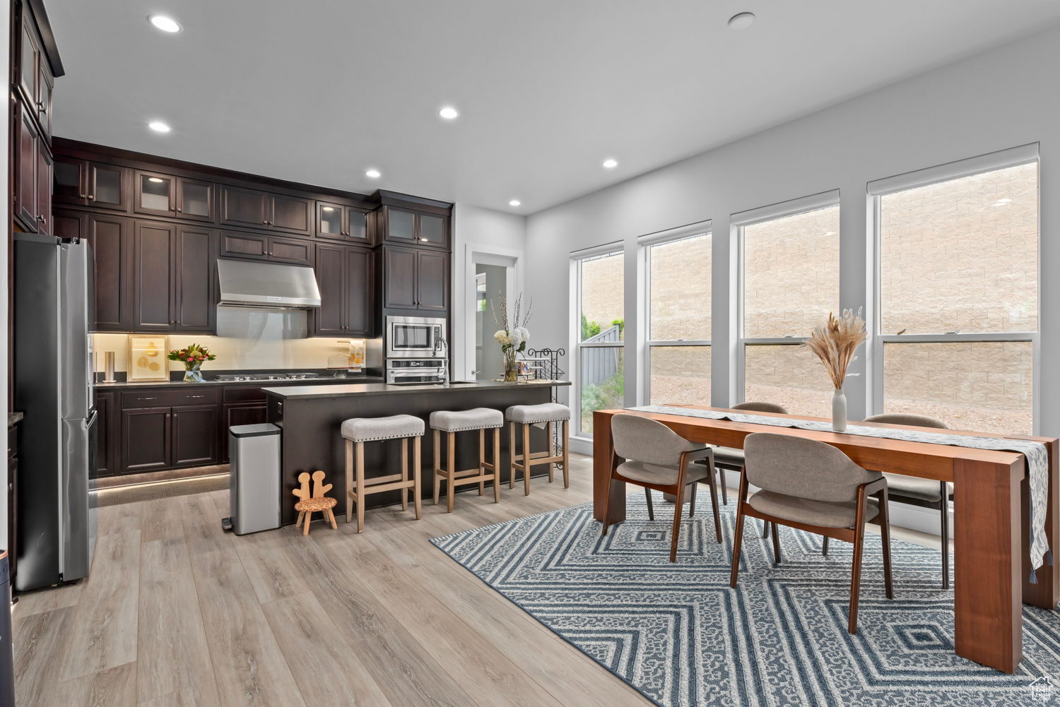 Dining space featuring light hardwood / wood-style flooring