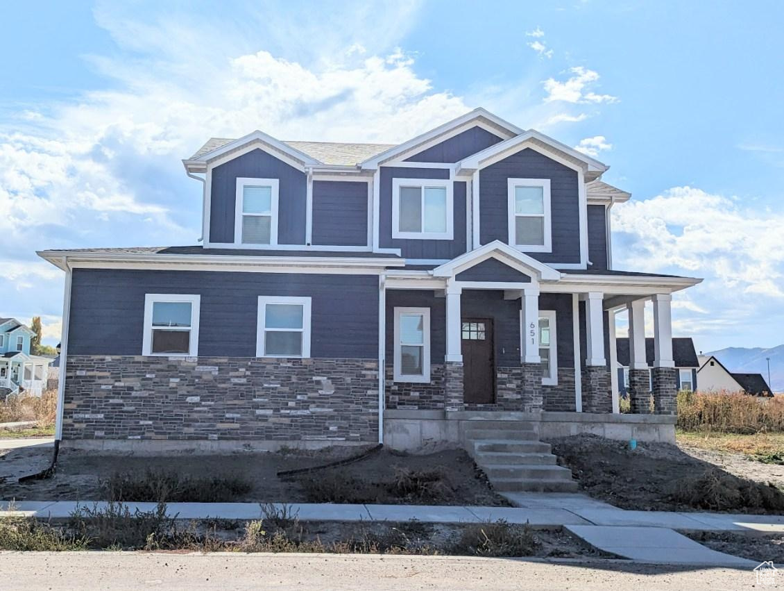 View of front of house featuring covered porch