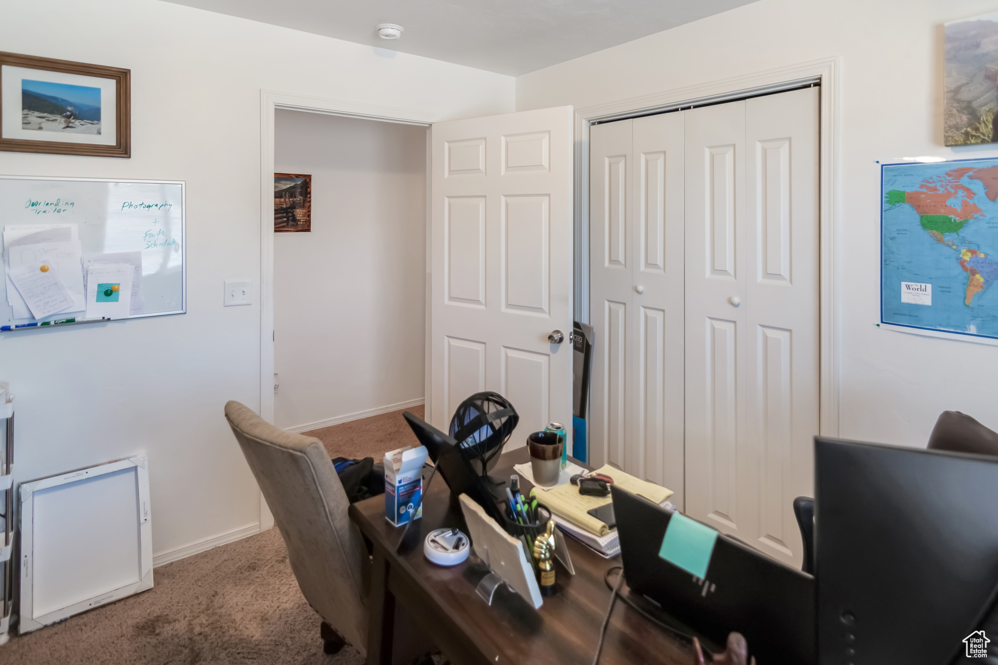 View of carpeted home office