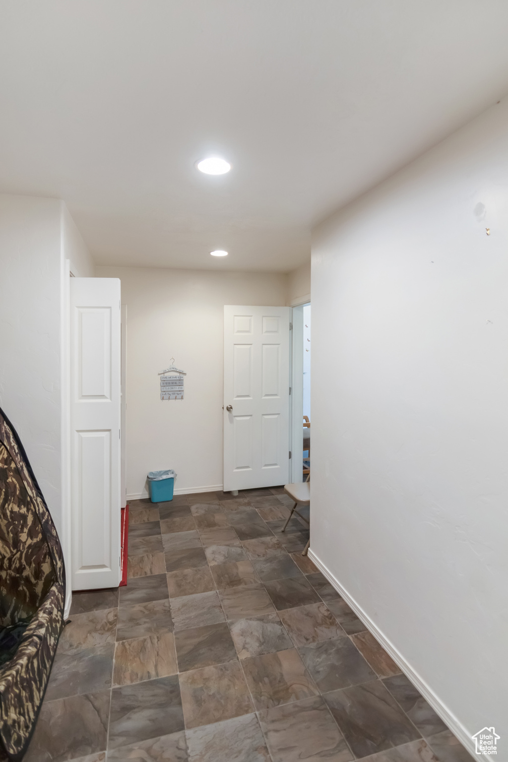 Interior space featuring dark tile flooring