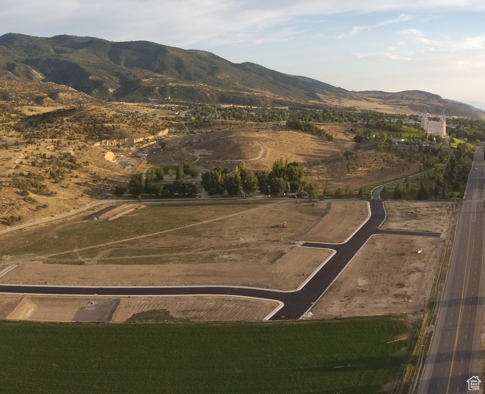 Property view of mountains with a rural view