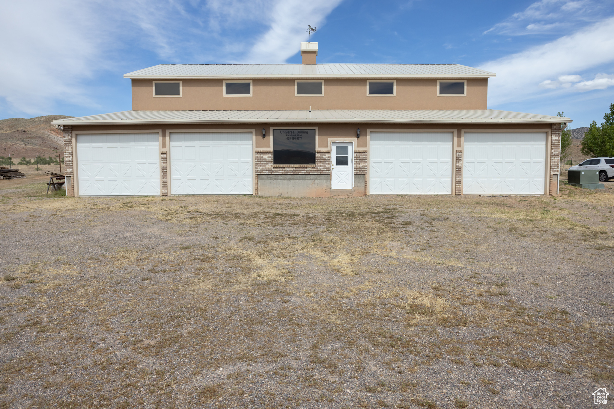 View of front of home featuring a garage