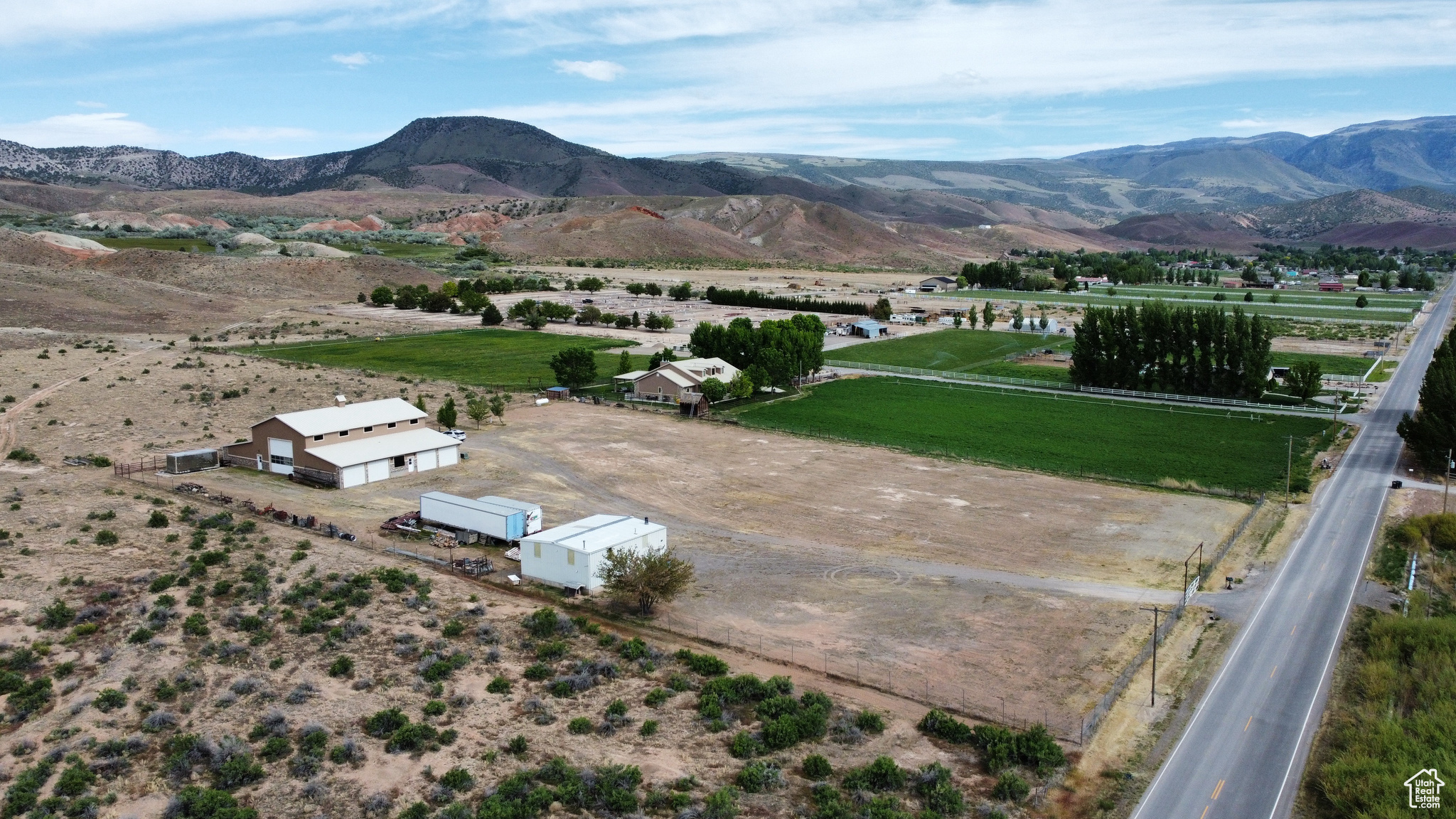 Birds eye view of property with a mountain view