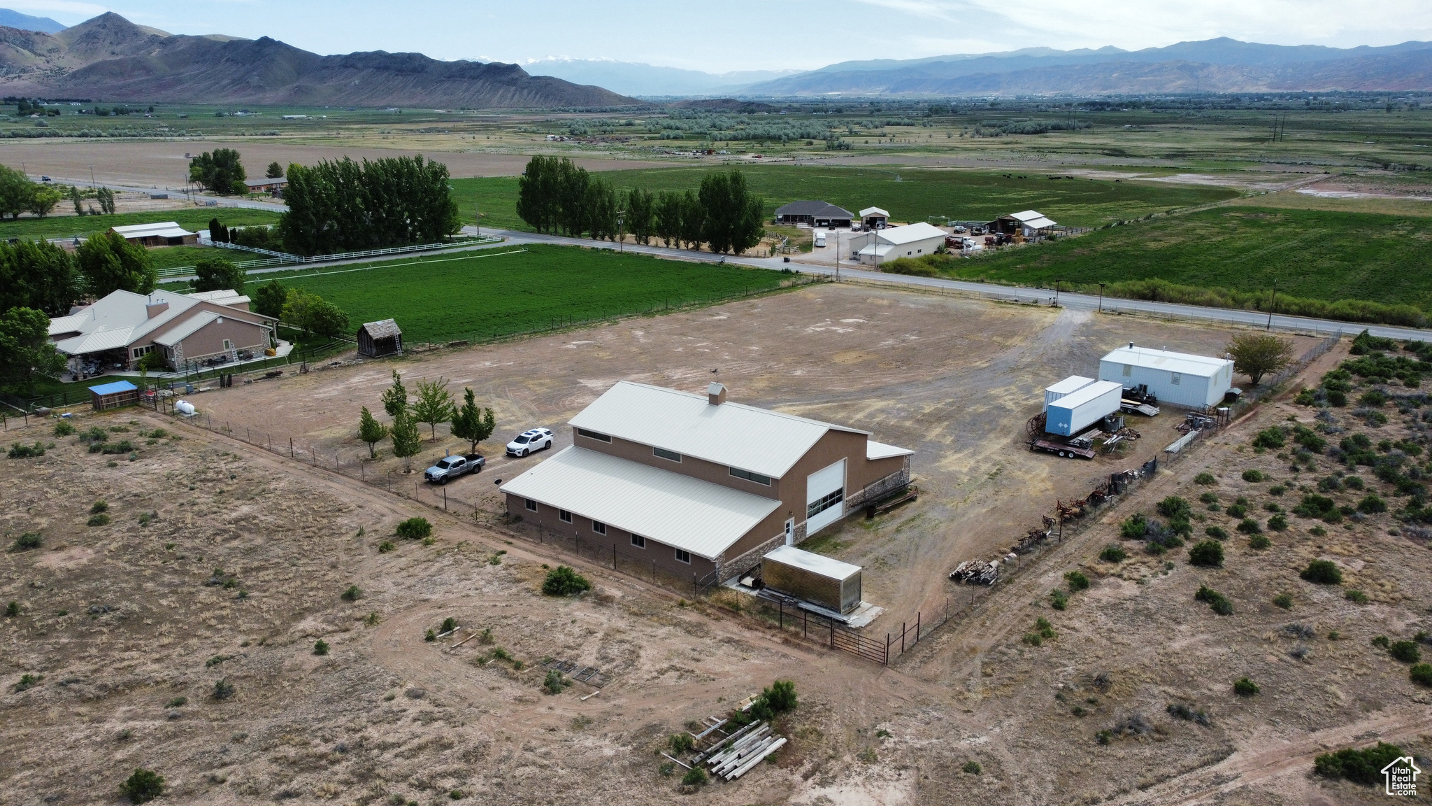 Birds eye view of property featuring a rural view and a mountain view