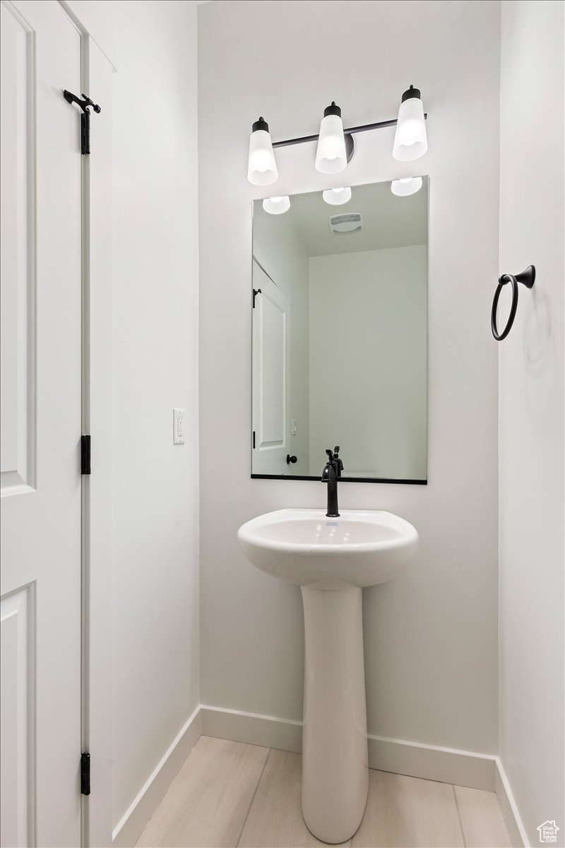 Bathroom with tile flooring