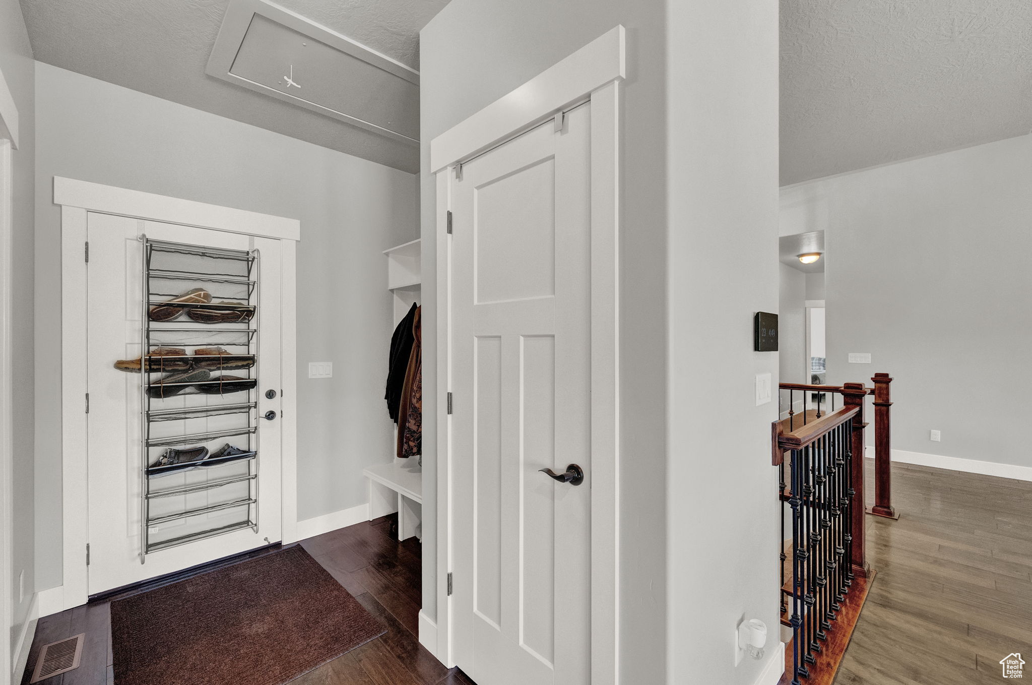 Interior space featuring dark hardwood / wood-style floors